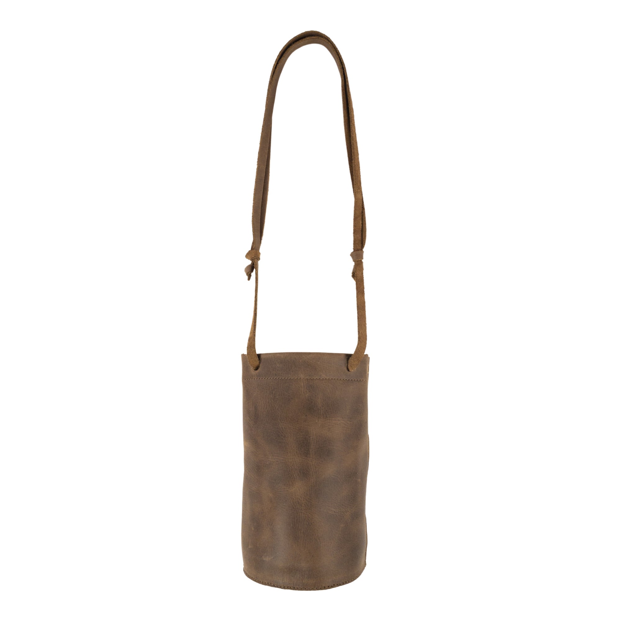 Heather's Cylinder Shoulder Phone Bag displayed upright, showing its unique cylinder shape. This adjustable shoulder strap crossbody bag is made from premium full grain leather, epitomizing the artisan quality from StockyardX with a focus on small batch production and hand cut, hand sewn methods. Handmade in La Antigua Guatemala & Oaxaca Mexico.