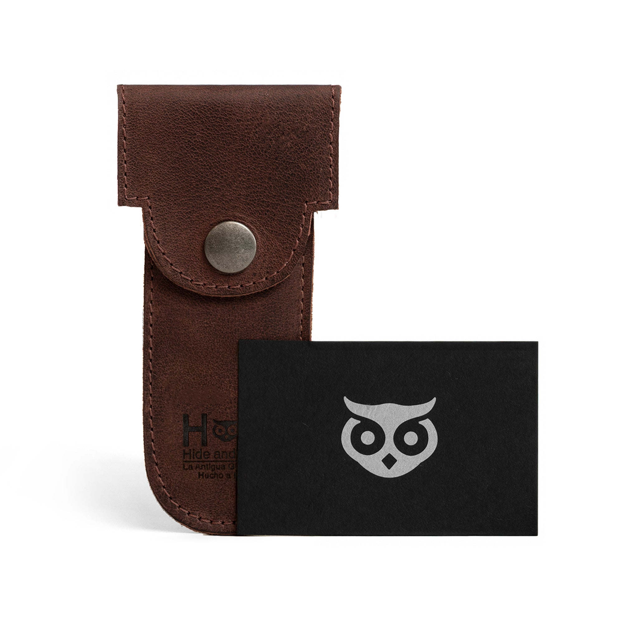Hide & Drink Barber Razor Sheath displayed with its branded card, a charming example of a Double Edge Protector Case in Full Grain Leather. This Safety Cover is ideal for those commuting, providing a portable carry bag that showcases artisan craftsmanship.
