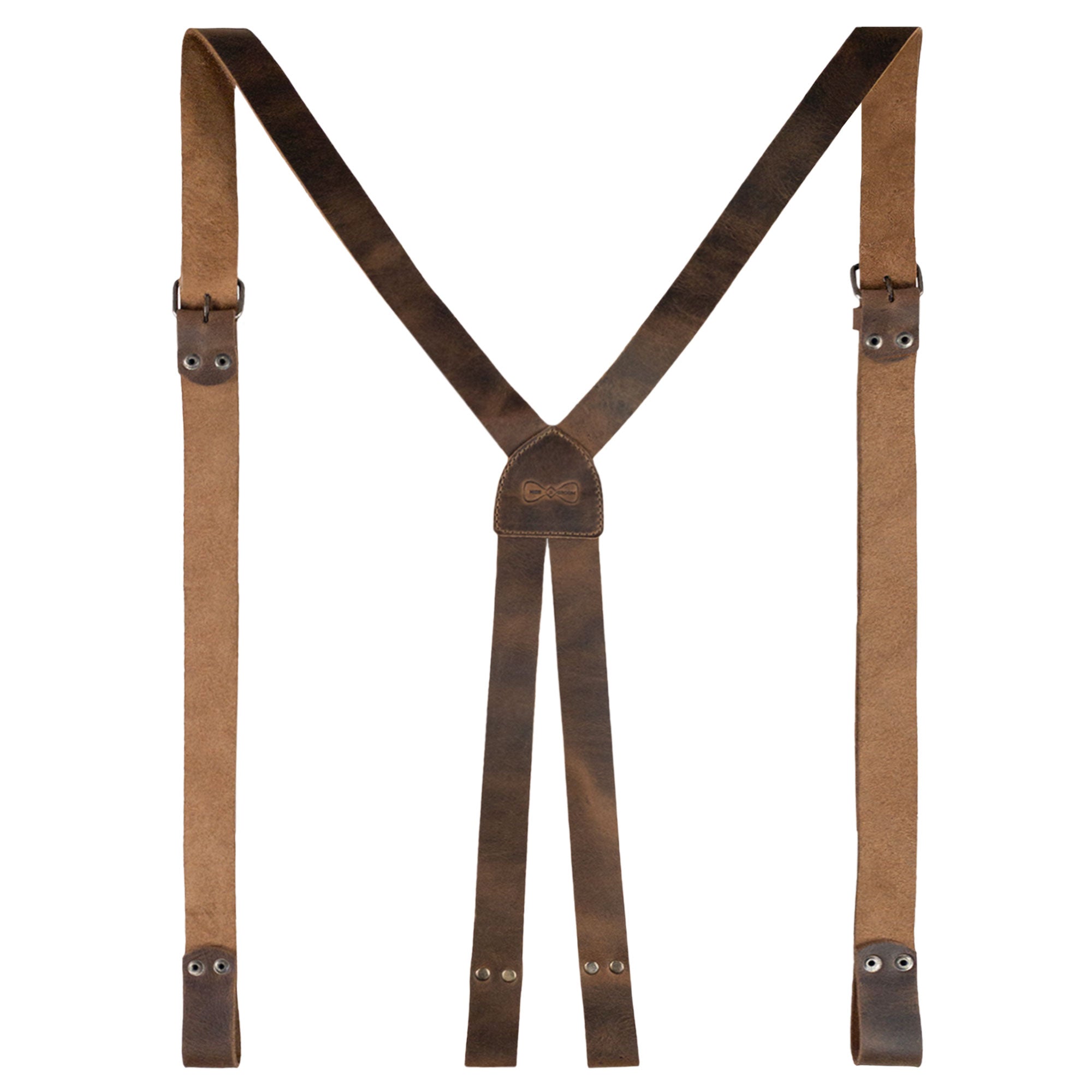 A close-up of Hide & Groom's X Back Formal Suspenders with Belt Loops in a sophisticated design. Crafted for groomsmen and formal events, these suspenders are made from full grain leather and exemplify handmade quality from La Antigua Guatemala.