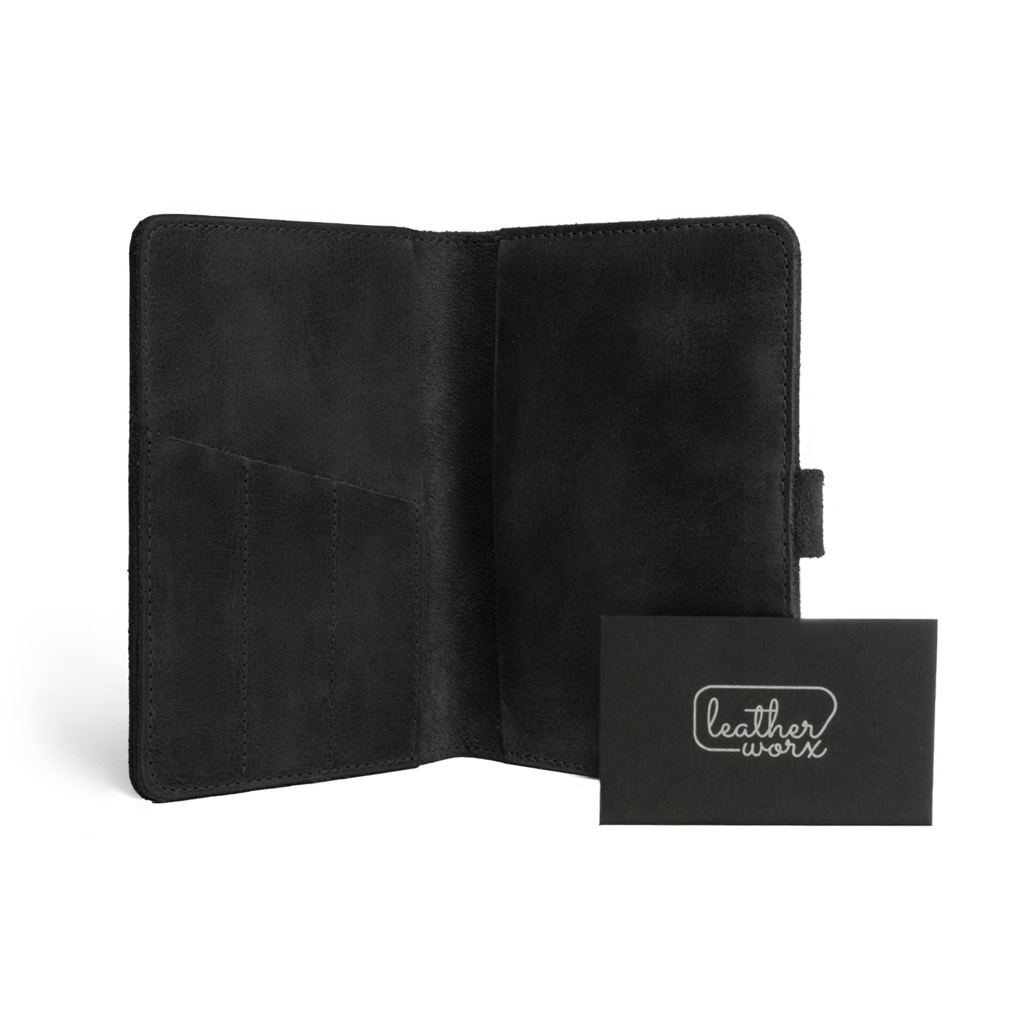 Open view of Leather Worx Field Notes Cover 3.5 x 5.5 in. Cover with Pen Slots in black with a complementary card, showcasing the attention to detail. This Full Grain Leather Cover for Field Notes (3.5 x 5.5 in.) with Pen Slots is ideal as a notebook case, made with artisan skill in La Antigua Guatemala and Oaxaca Mexico.