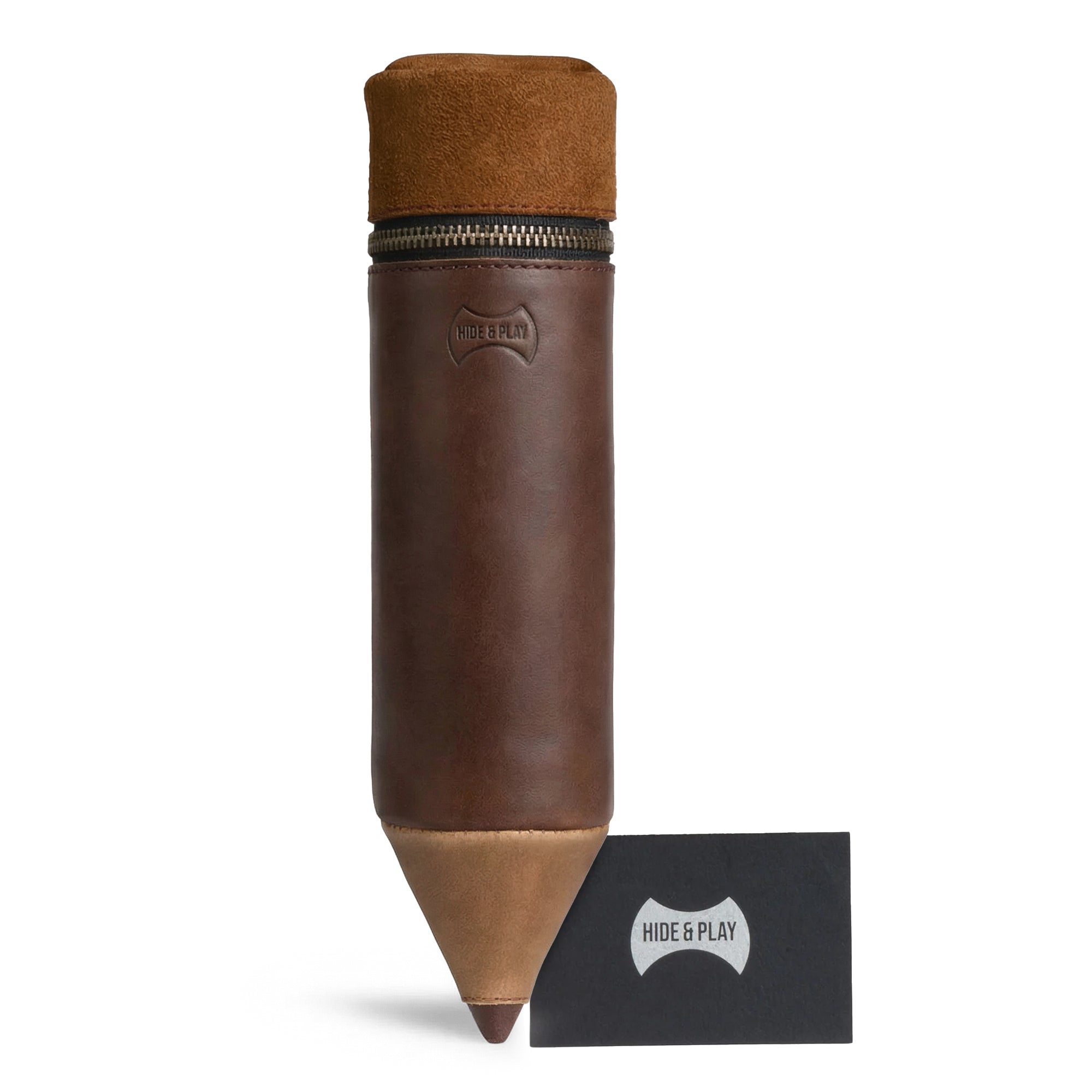 Pencil-Shaped Case by Hide & Play alongside packaging, highlighting its unique design for organizing writing instruments. This artisan-crafted zippered bag made of full grain leather combines functionality with style for office accessories.