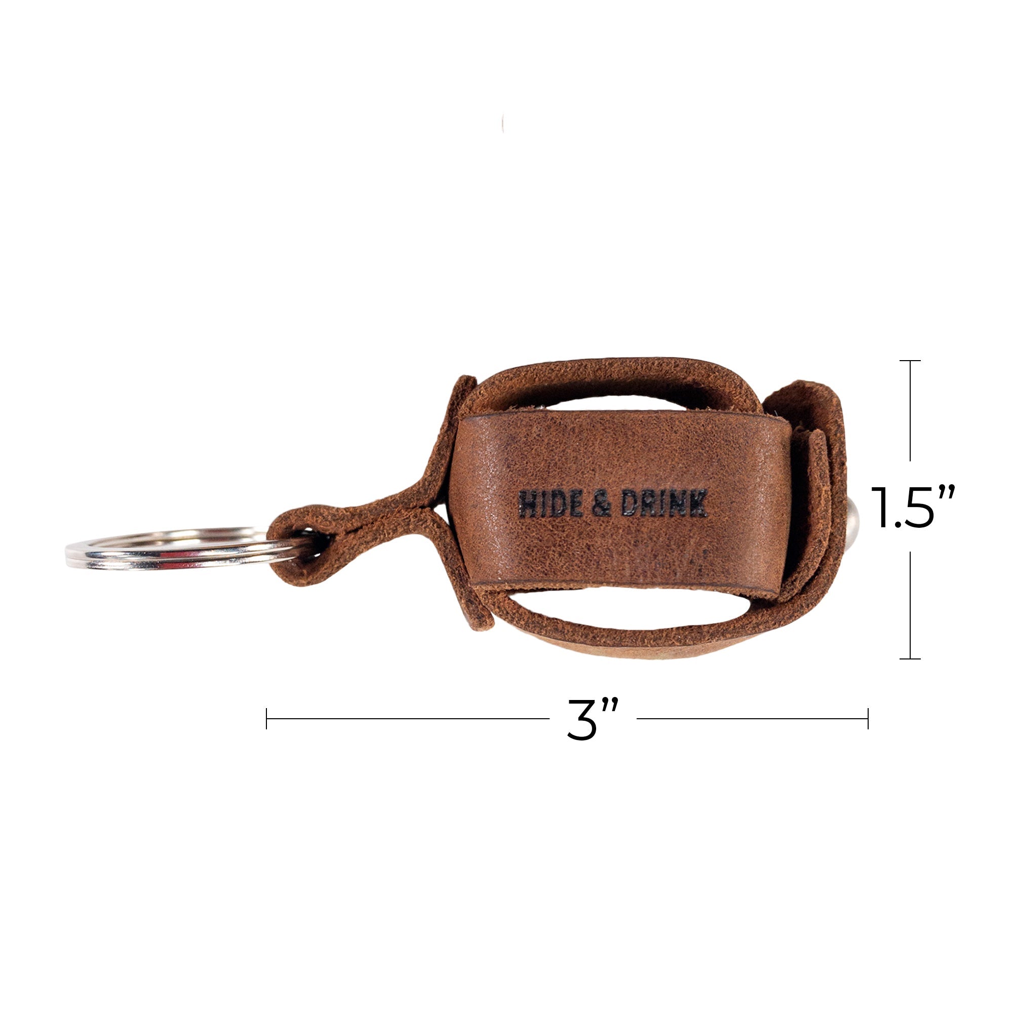 Showcasing the dimensions of the Hide & Drink Measuring Tape Holder Keychain, designed to hold measuring tape (Tape not Included) in a stylish way. Crafted from Full Grain Leather, it serves as a key ring organizer perfect for tailor accessories. The product reflects artisan craftsmanship from small batch production, with hand cut, hand sewn elements, fire branded, and handmade in La Antigua Guatemala & Oaxaca Mexico.