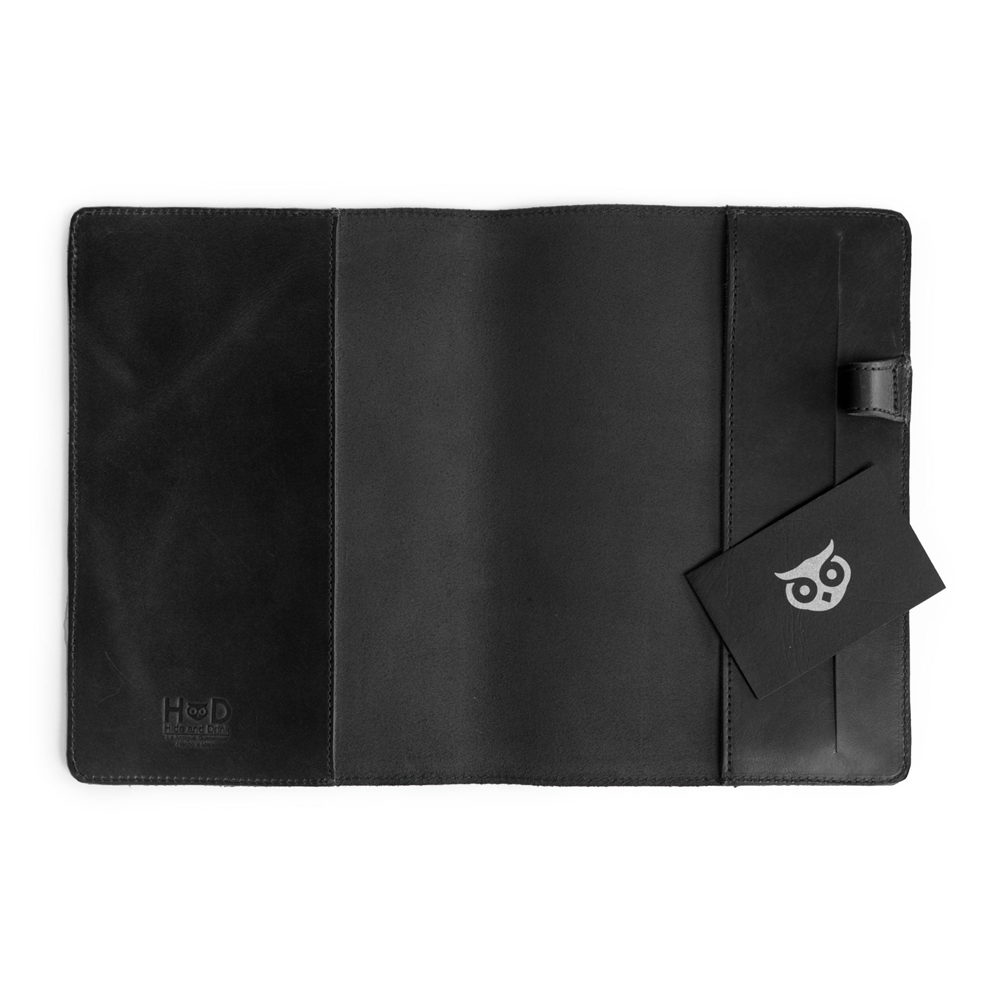 Close-up view of the black Leuchtturm A5 Hardcover Case by Hide & Drink, featuring a card slot and interior stitching detail. This Case for Hardcover Leuchtturm A5 (5.75 x 8.25 in.) Notebook serves as a refined protective cover for your journal or personal planner, made of high-quality full grain leather. StockyardX, Small Batch Production, Hand Cut, Hand Sewn, Fire Branded, Artisan, Handmade in La Antigua Guatemala & Oaxaca Mexico.