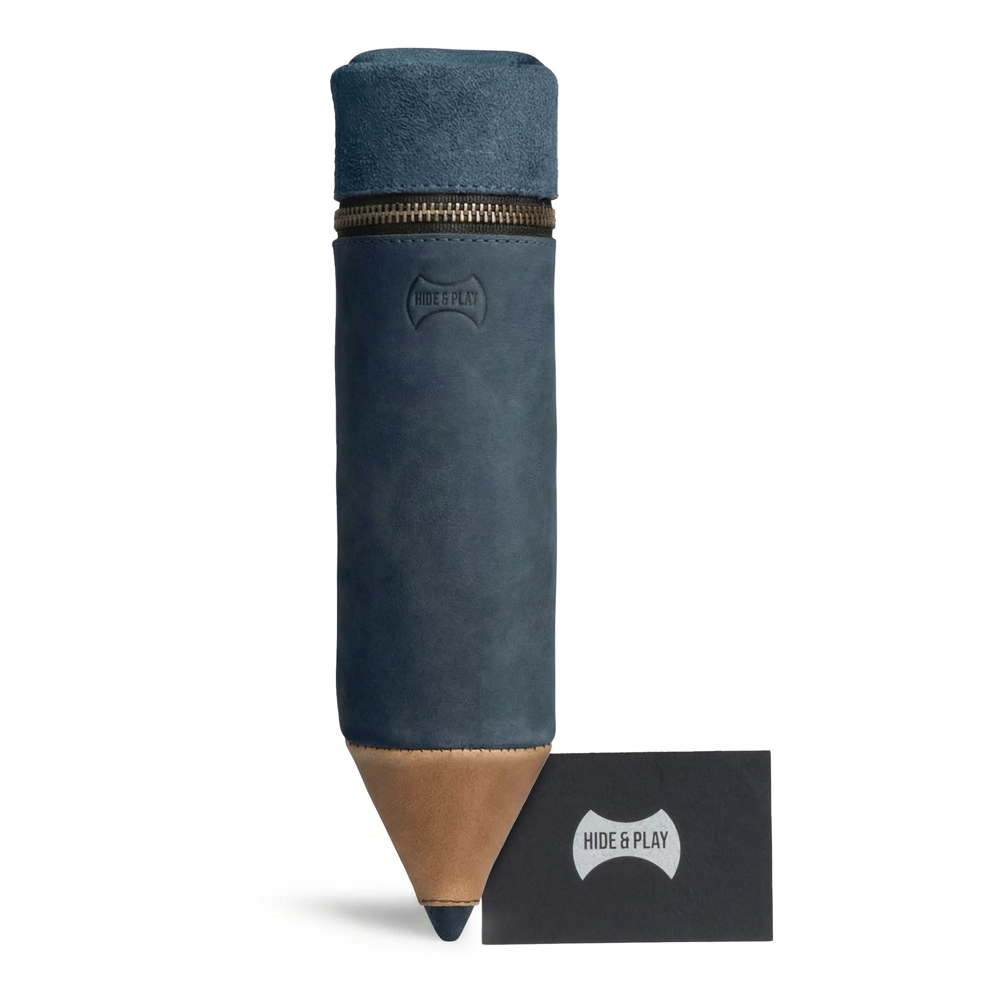 Pencil-Shaped Case by Hide & Play displayed alongside a branded card, emphasizing its role as a chic storage option for pens, pencils, markers, and office accessories. This zippered bag is made of high-quality full grain leather with artisan features, including small batch production, hand cut, hand sewn, and fire branded craftsmanship. Handmade in La Antigua Guatemala.