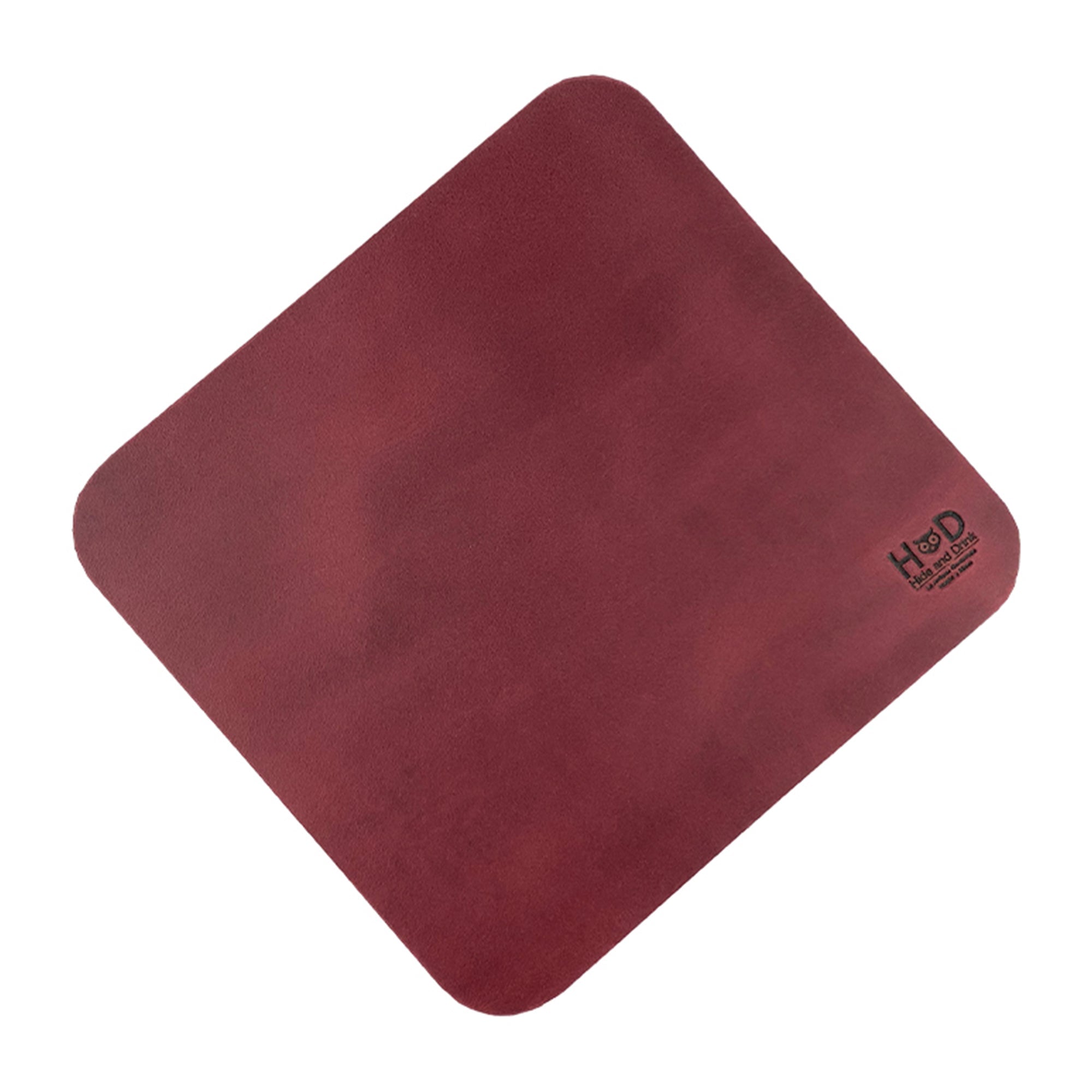 Hide & Drink Mousepad displaying a luxurious red leather surface, perfect for a chic workspace. This artisan-crafted mousepad offers anti-slip features for productivity, made in La Antigua Guatemala & Oaxaca Mexico.