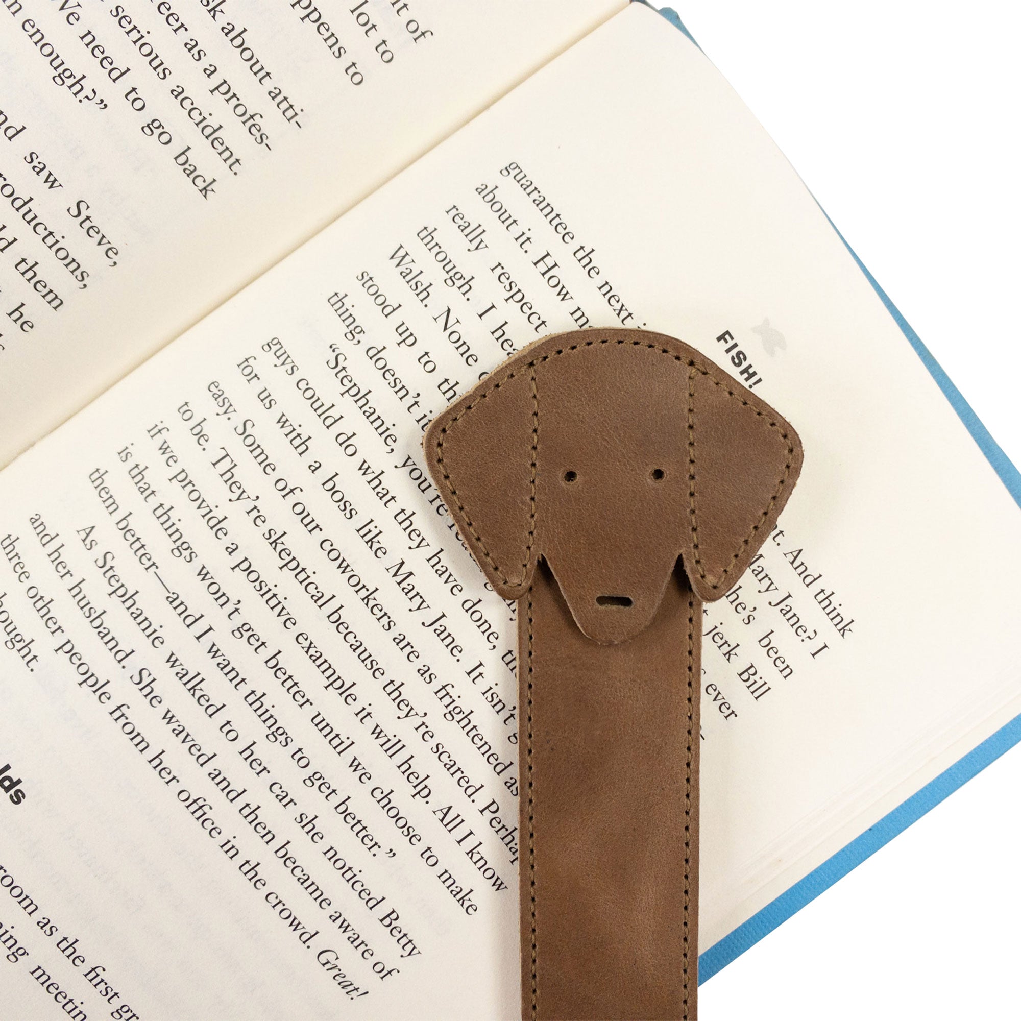 Hide & Drink's tan Dog Bookmark with packaging, illustrating its quality Full Grain Leather material. This artisan bookmark celebrates small batch production and fire branding, proudly made in La Antigua Guatemala & Oaxaca Mexico.