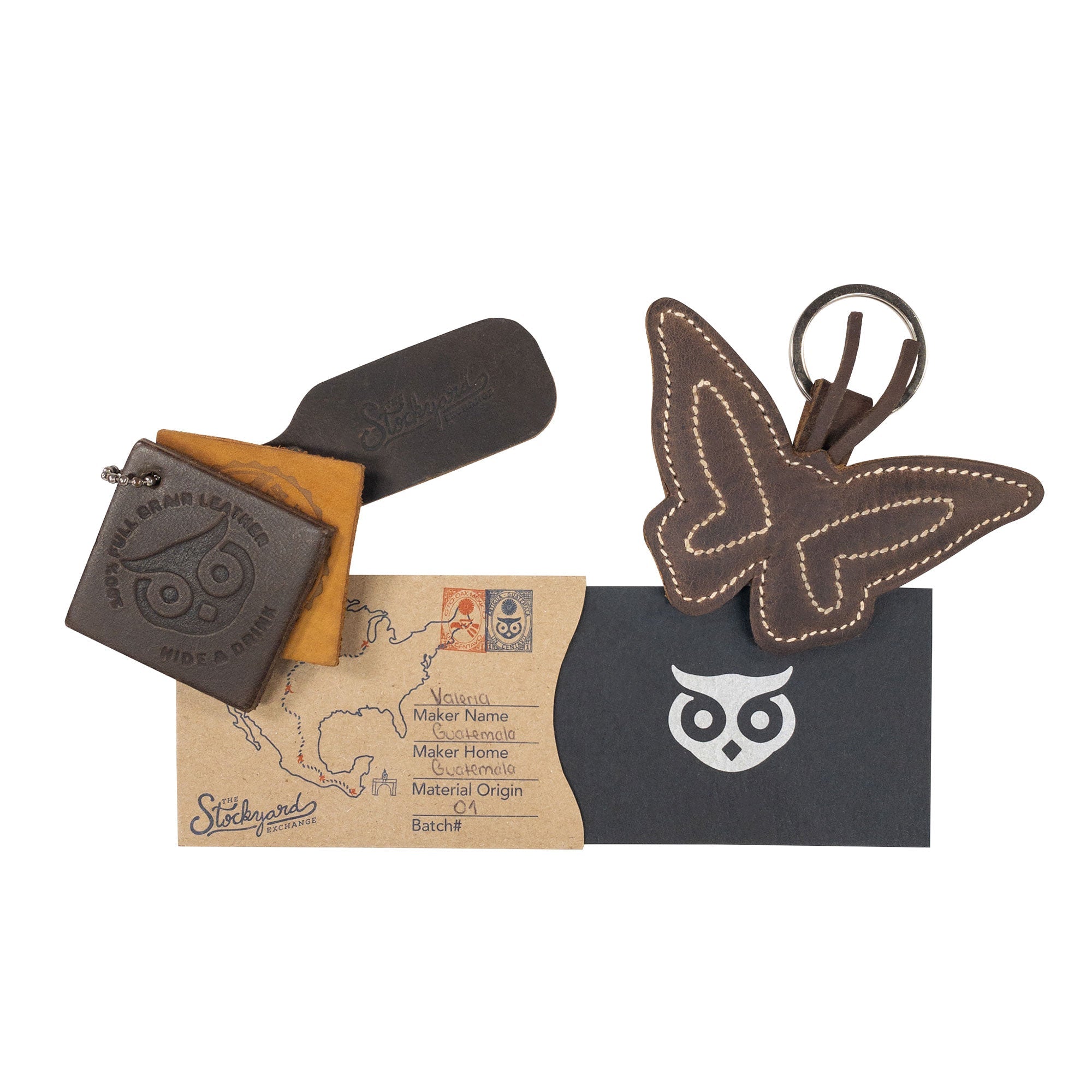 Presentation of the Butterfly Keychain by Hide & Drink along with associated packaging, showcasing the artisan craftsmanship and dedication to quality. This full grain leather key ring is a meaningful gift for nature lovers, emphasizing small batch production.