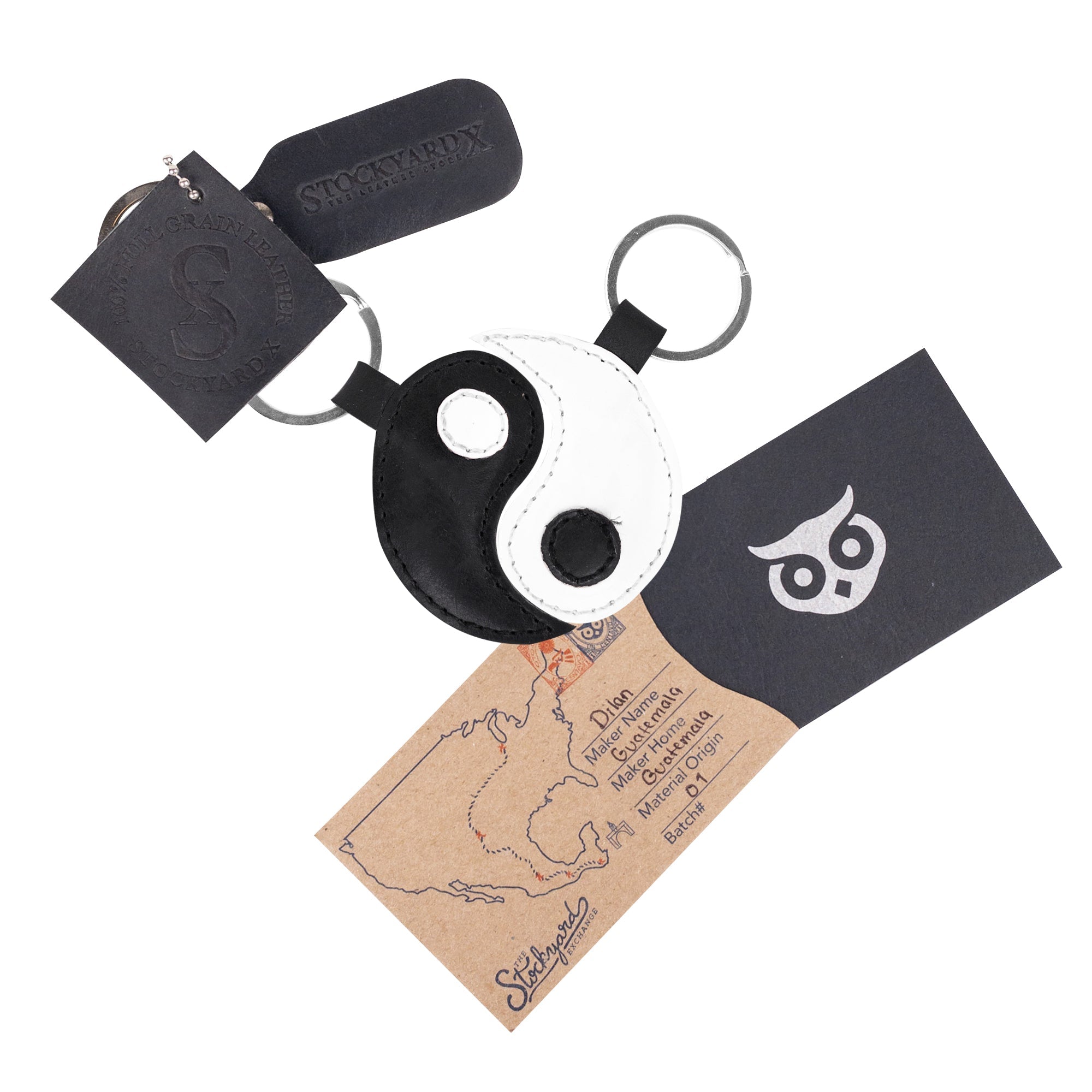 Complete set of Yin Yang Keychains (2 pieces) created by Hide & Drink, accompanied by key rings symbolizing harmony and partnership. These full grain leather accessories embrace Chinese culture and the spirit of friendship, reflecting quality through small batch production. Each piece is hand cut, hand sewn, and fire branded to guarantee excellence, an artisan creation made in La Antigua Guatemala & Oaxaca Mexico.