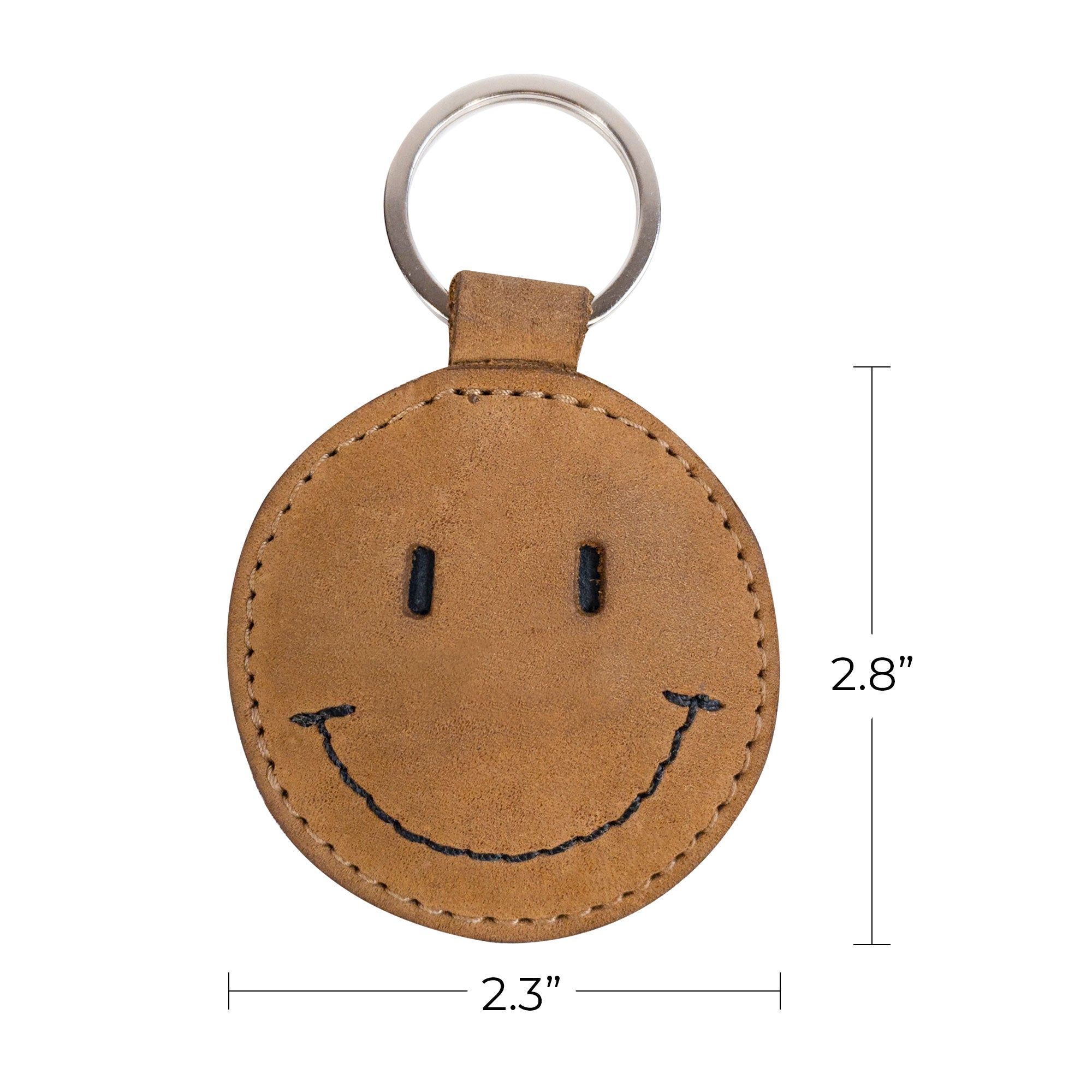 The dimensions of the Smiley Face Keychain by Hide & Drink on display, illustrating its compact size. This handmade accessory is made of durable Full Grain Leather, ideal for anyone looking for cute gifts and stylish accessories. A testament to artisan craftsmanship in La Antigua Guatemala.