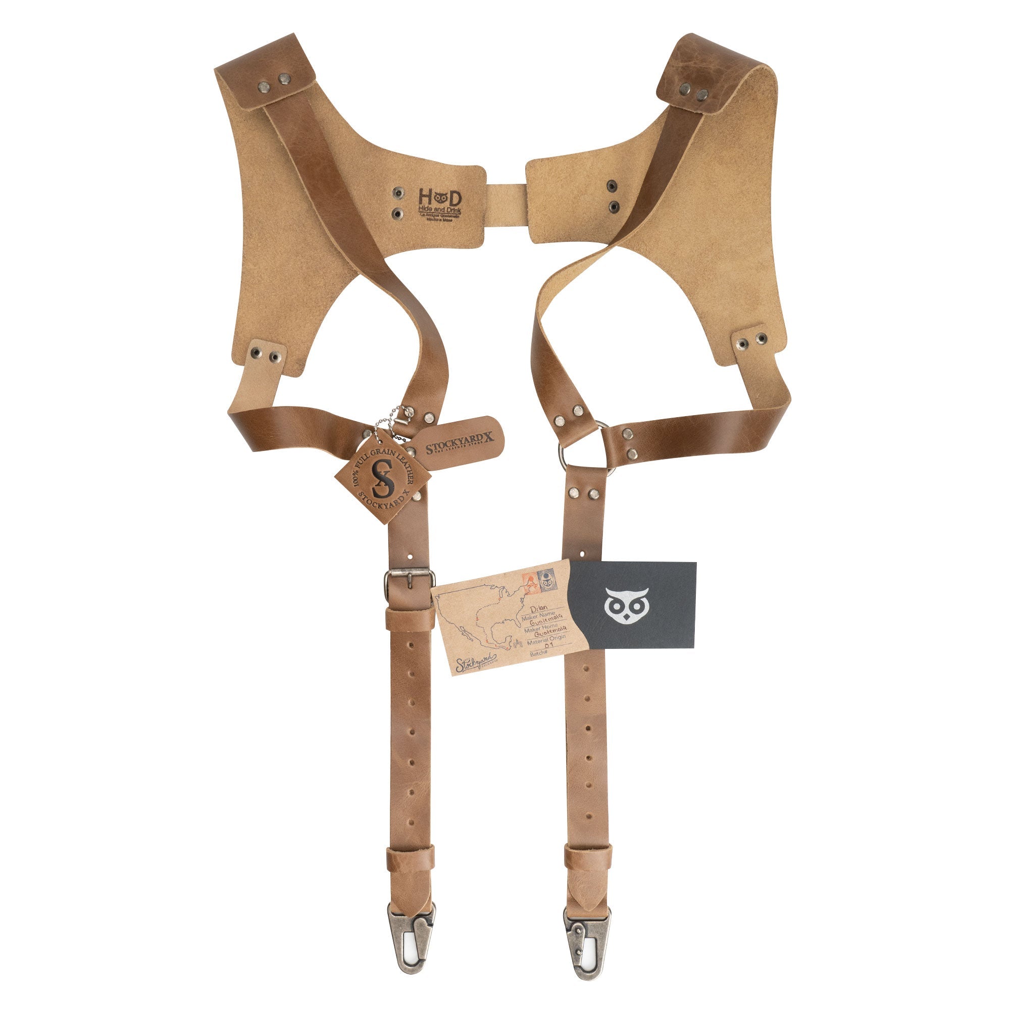 Tan Renaissance Suspenders by Hide & Drink displayed with additional tags, focusing on craftsmanship. These back support harness for men are great for best men, showcasing small batch production.