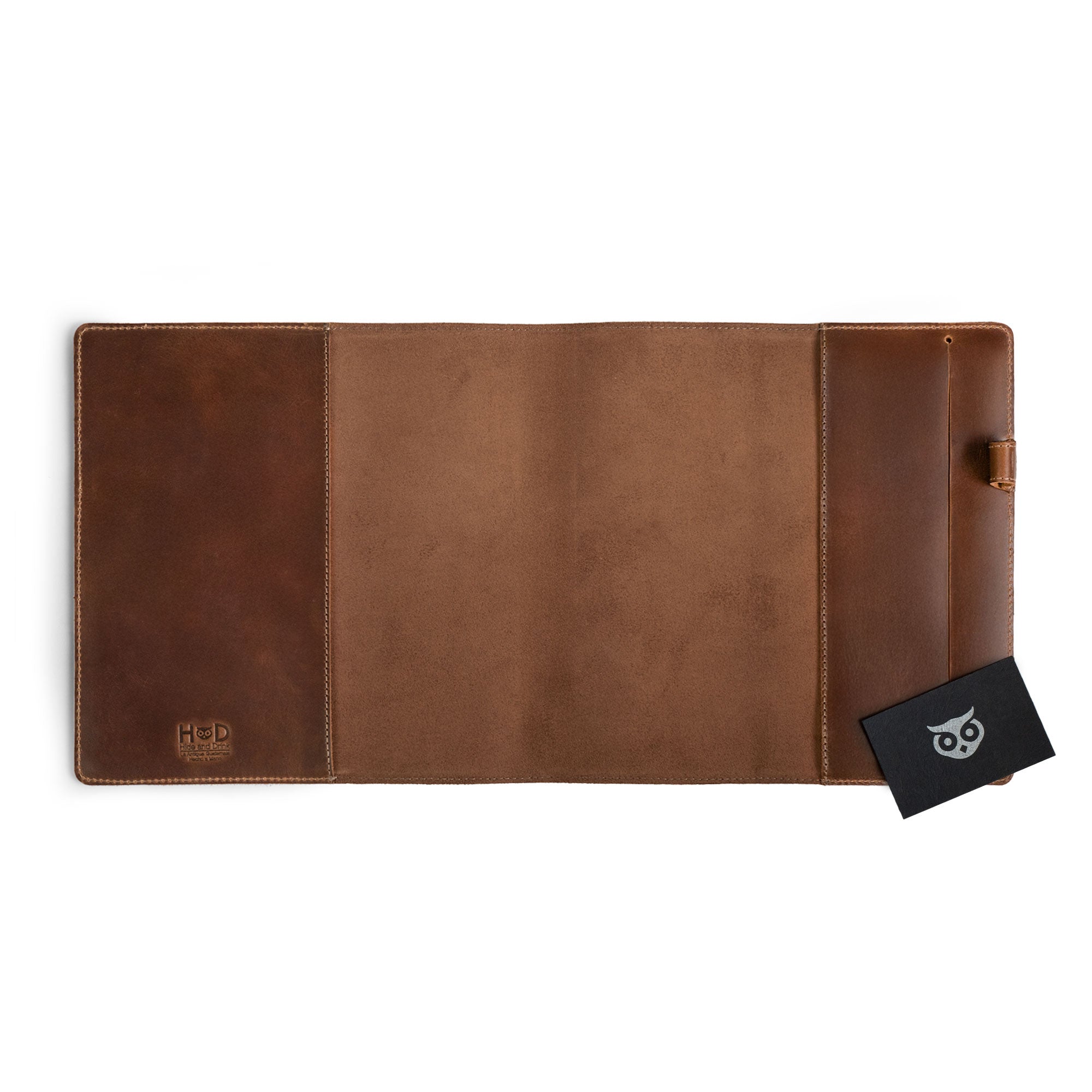 The inside view of the Cover for Leuchtturm1917 Sketchbook Hardcover Square Size (225 x 225 mm) by Hide & Drink, displaying its spacious pockets and full grain leather. This notebook case reflects artisan craftsmanship, focusing on small batch production with hand cut and hand sewn features, along with fire branded elements, handmade in La Antigua Guatemala & Oaxaca Mexico.
