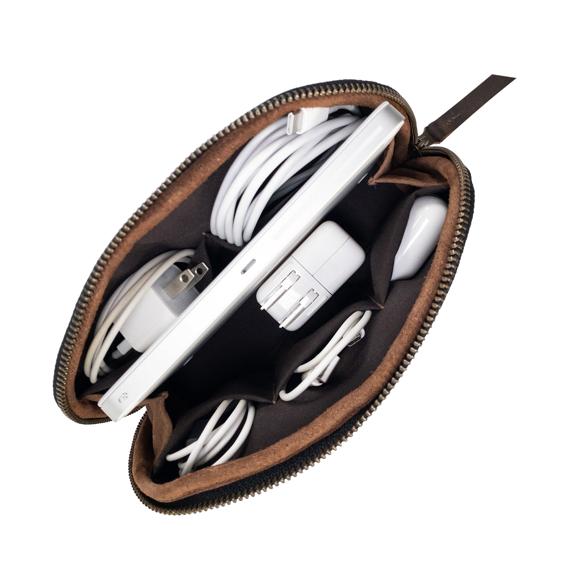 Inside view of Hide & Drink's Small Tech Organizer showcasing inner slots, perfect for organizing cables and chargers. This zippered bag is a must-have travel accessory, crafted from full grain leather and handmade in La Antigua Guatemala & Oaxaca Mexico.