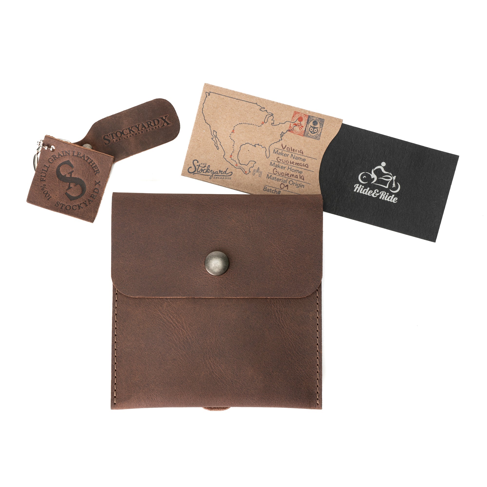 Hide & Ride Document Handlebar Bag featuring a compact design made from full grain leather, perfect for bikers. This Motorcycle Document Bag is a small bag for handlebar use, showcasing its artisanal quality with hand cut and hand sewn details. Made in La Antigua Guatemala & Oaxaca Mexico by StockyardX, it serves as a stylish and practical biker accessory.