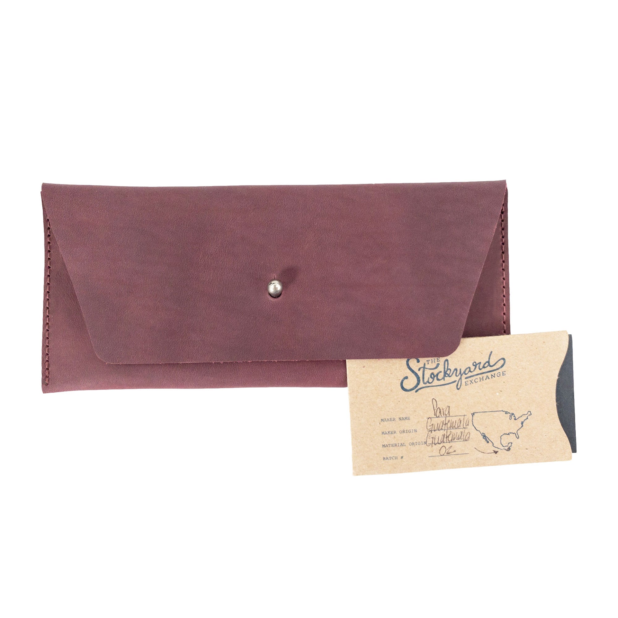 Showcasing the earthy Long Utility Pouch by Hide & Drink with a gift card, perfect as a unique gift option. Ideal for carrying cash and cards with elegance.