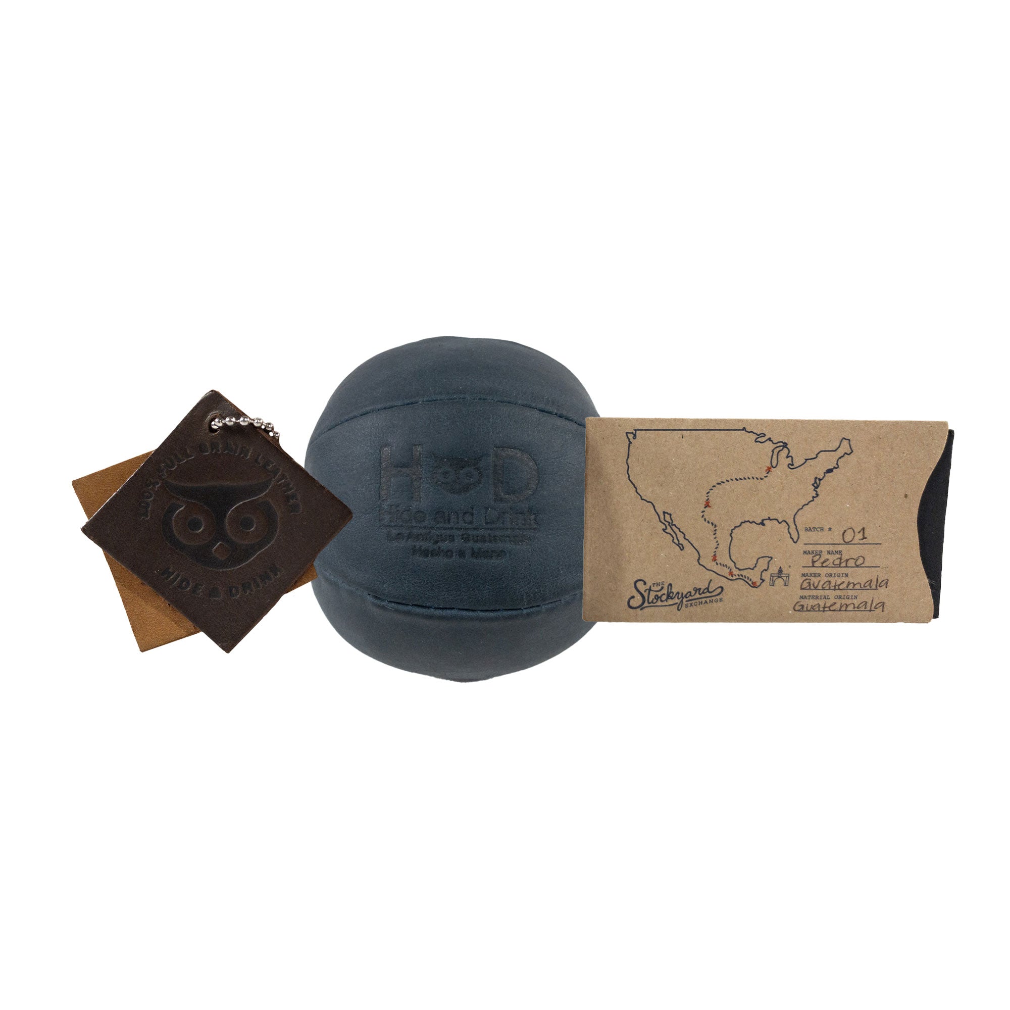 Hide & Drink navy Stress Ball dimensions highlighted, showing its compact size of 2.5 inches for easy portability. Great for relieving fidgeting and anxiety while showcasing classic design, handcrafted in La Antigua Guatemala.