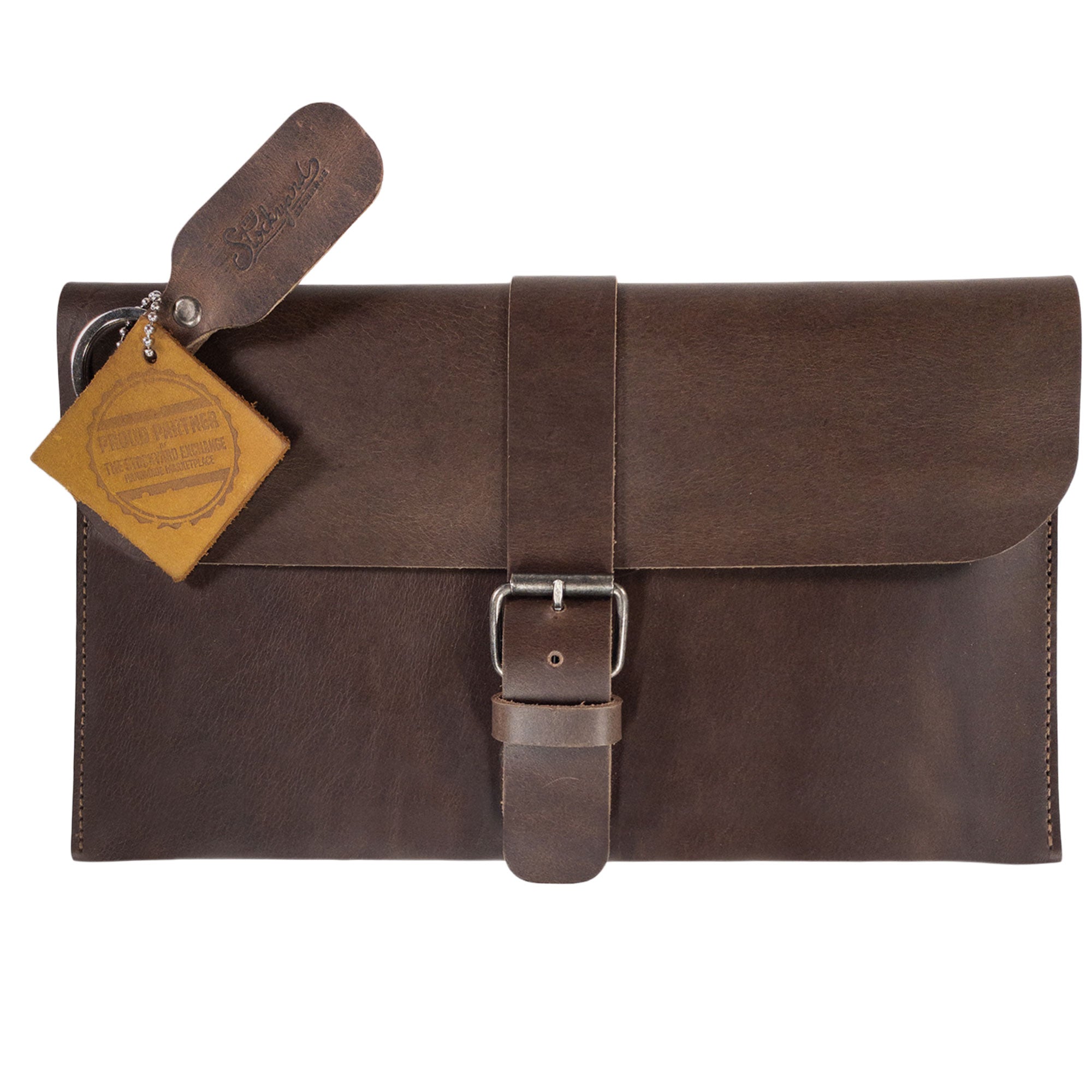 Front view of La Antigua's Rectangular Case for Notebook, a stylish protective cover designed for 8.25 x 5 in. notebooks. This classic sleeve, made from rich full grain leather, offers a blend of practicality and artisan charm. Hand cut, hand sewn, and fire branded, it’s a testament to small batch production from La Antigua Guatemala and Oaxaca Mexico.