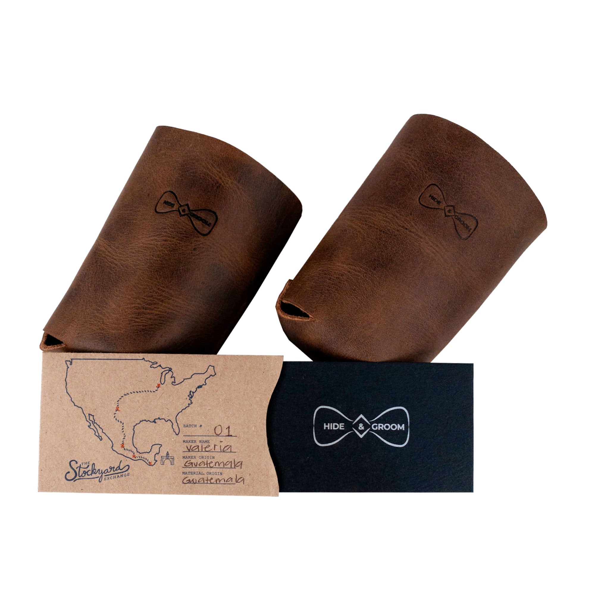 Presentation of the Hide & Groom Beer Can Sleeve (Set of 2) alongside product packaging, showcasing their artisan nature. Perfect for weddings, these full grain leather sleeves are collapsible best man accessories made with care in La Antigua Guatemala & Oaxaca Mexico, featuring hand cut and sewn details.