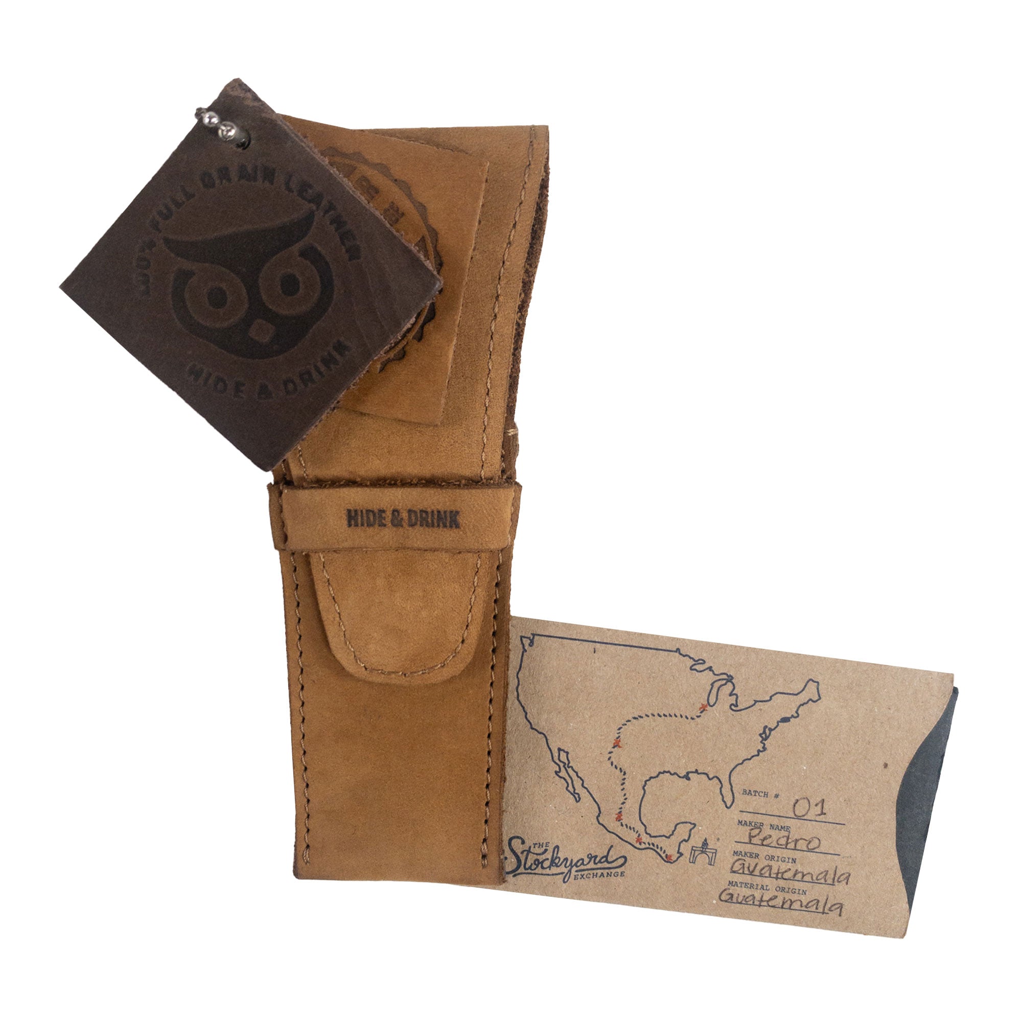 The brown Safety Razor Case by Hide & Drink, with accompanying tags showcasing its artisan quality. This full grain leather case is ideal for shaving accessories and personal care, handmade in small batches in La Antigua Guatemala and Oaxaca Mexico.