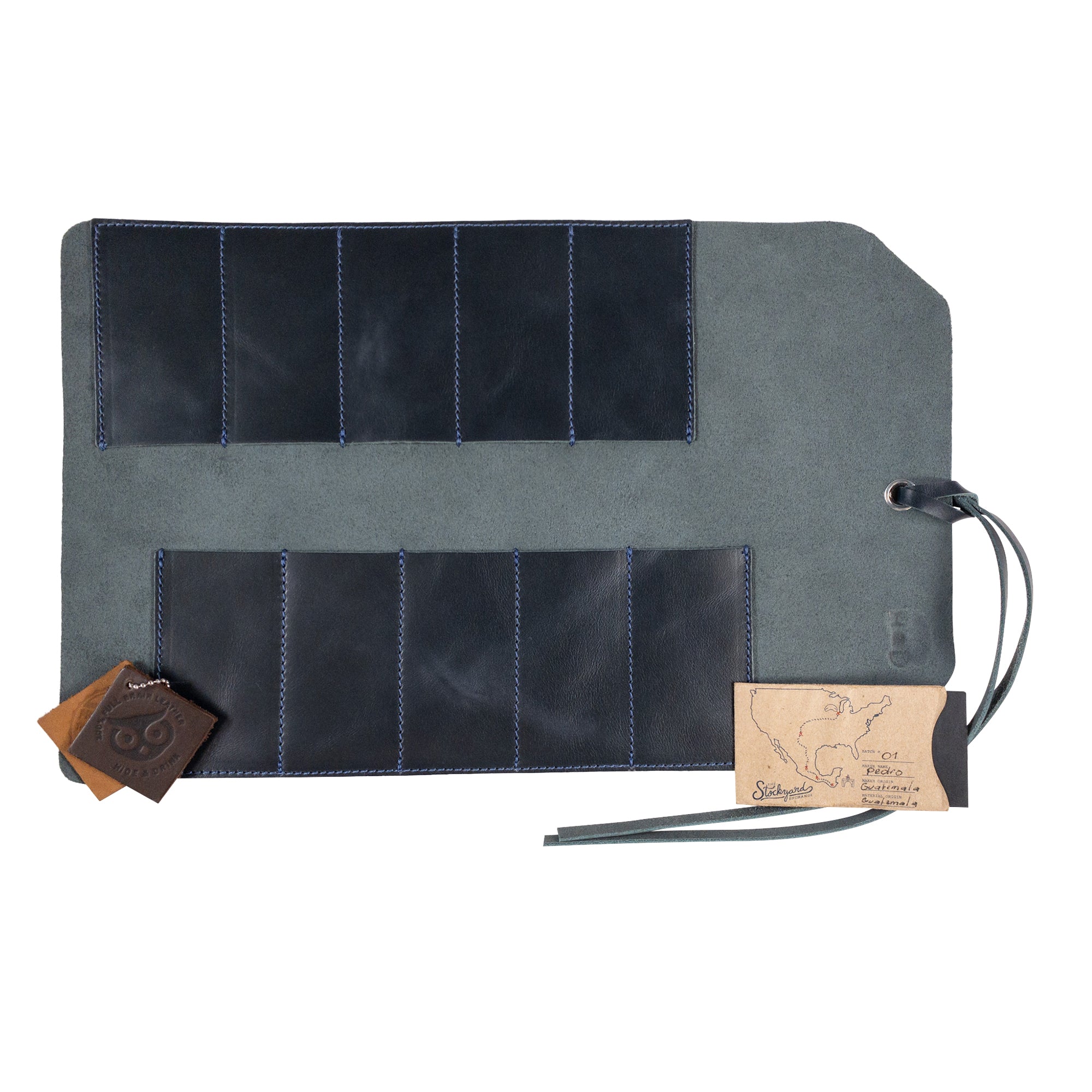 Hide & Drink Tool Roll features a premium small tool roll-up bag with 10 slots, constructed from durable full grain leather. Perfect as a portable carry-on pouch for organizing woodworking tools, this bag improves your workshop storage capacity. Each artisan item is handcrafted in La Antigua Guatemala & Oaxaca Mexico.