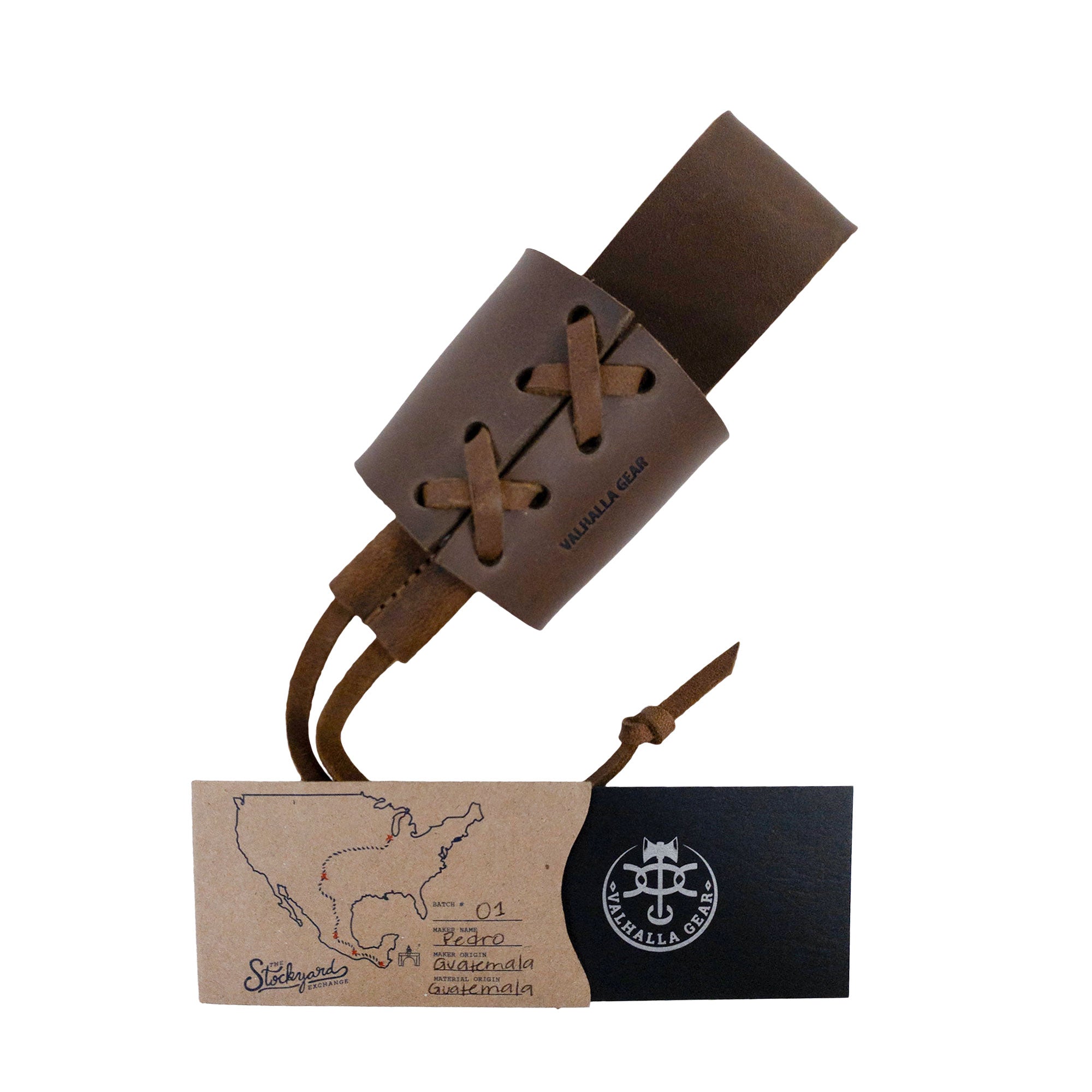 Product packaging of the Braided Axe Holder with Belt Loop from Valhalla Gear, highlighting its artisan nature and full grain leather material. This handmade accessory is perfect for tool organization and outdoor activities like camping and cosplay.