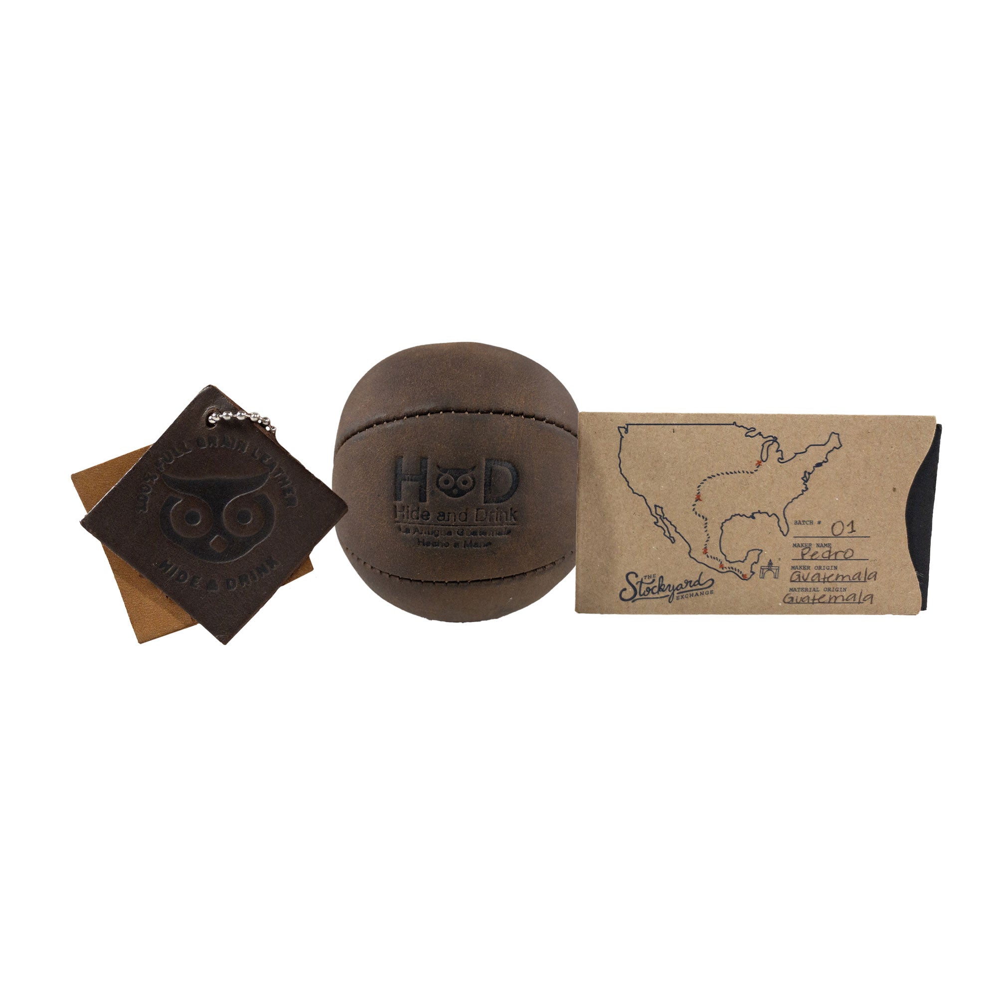 Hide & Drink Stress Ball with packaging, demonstrating its place as a thoughtful gift. An ideal squishy tension accessory to relieve fidgeting and anxiety made from full grain leather, handcrafted in La Antigua Guatemala.