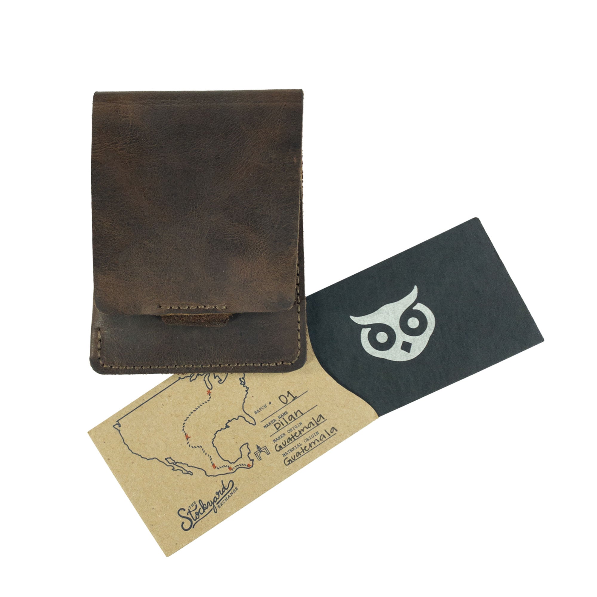 Hide & Drink Slim Card Holder displayed with brand packaging, a handmade wallet showcasing artisan craftsmanship. This full grain leather card holder organizes up to 4 cards and folded bills, reflecting the commitment to small batch production in La Antigua Guatemala.