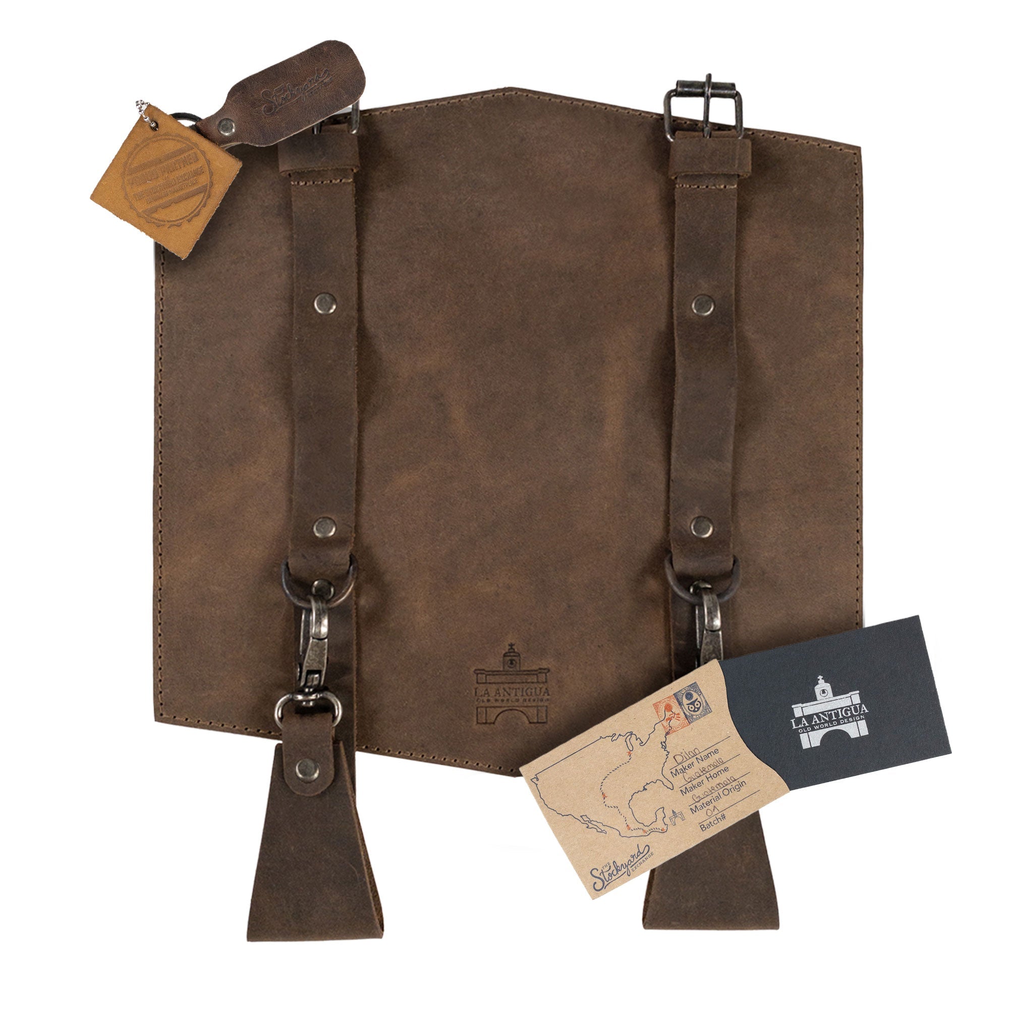 La Antigua's Map Holder for Belt is beautifully arranged with accessories and branding displays. This rustic multitool organizer is made from premium full grain leather, showcasing hand cut and hand sewn techniques, along with fire branding, embodying artisan quality made in La Antigua Guatemala & Oaxaca Mexico.