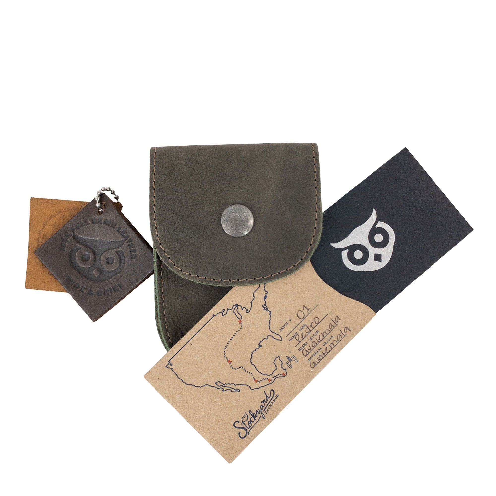 Open view of the Burgundy Holster Pouch by Hide & Drink, showcasing its storage capacity for essentials. Crafted from durable full grain leather, this artisan pouch is ideal for organizing coins and tools.