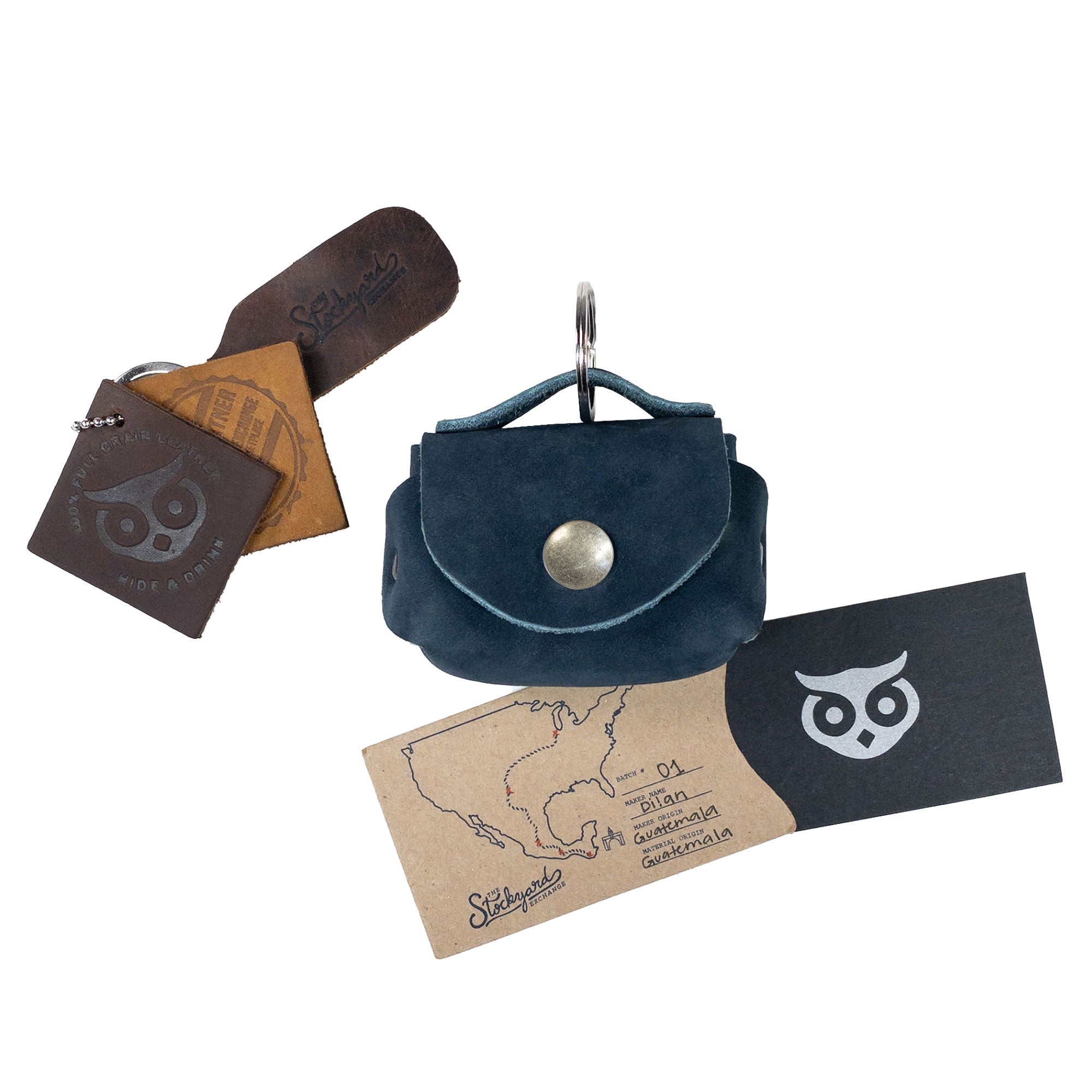 Dimensions display of the Tiny Handbag Keychain by Hide & Drink, measuring its compact size. This Tiny Handbag with Key Ring Holder is made of Full Grain Leather, showcasing its small batch production, hand cut and hand sewn quality, fire branded, and handmade in La Antigua Guatemala & Oaxaca Mexico.