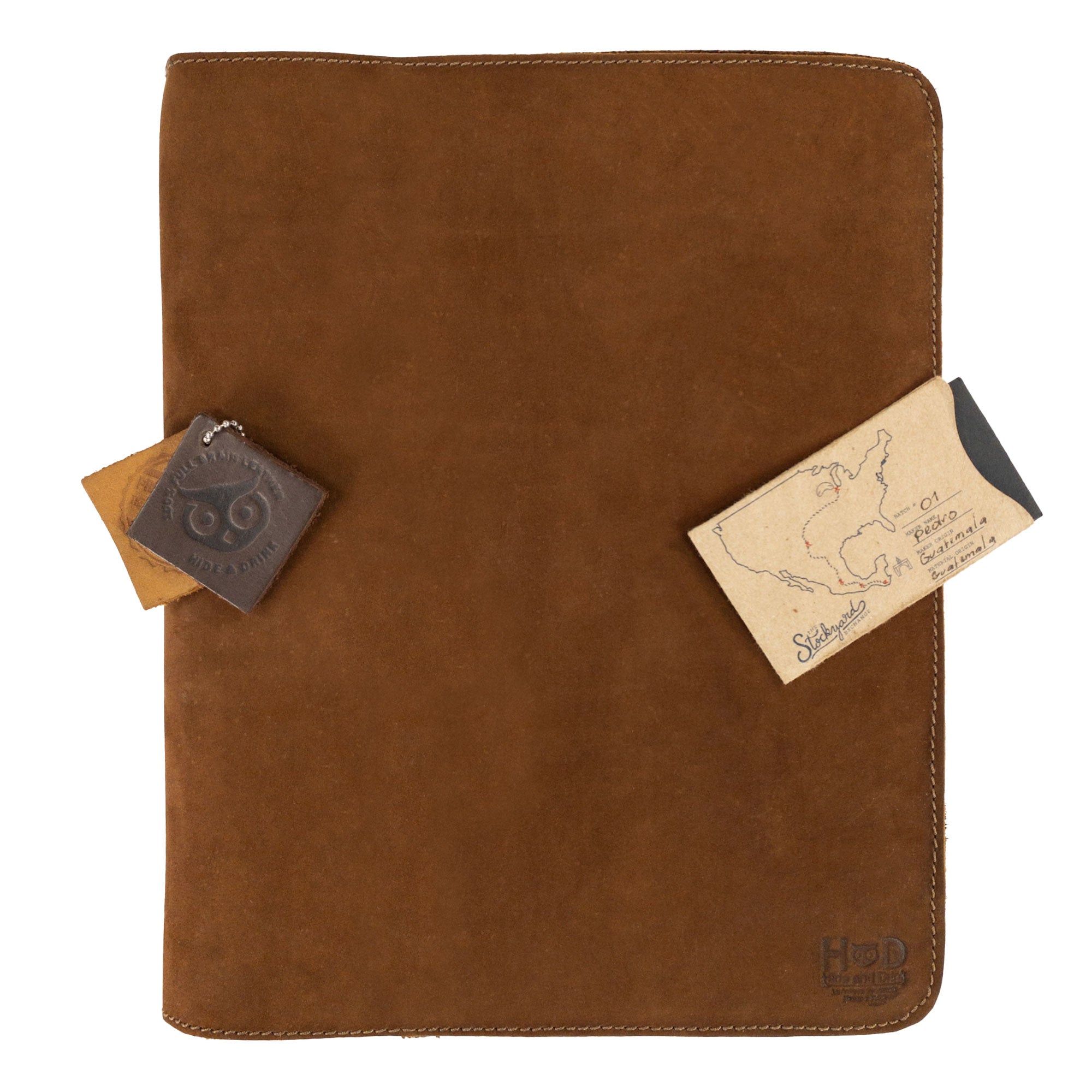 Another perspective of the Journal Cover for (8.5 x 11 in.) Moleskine Cahier XXL from Hide & Drink, highlighting its handcrafted details. This premium leather cover enhances any notebook experience, made in La Antigua Guatemala & Oaxaca Mexico.