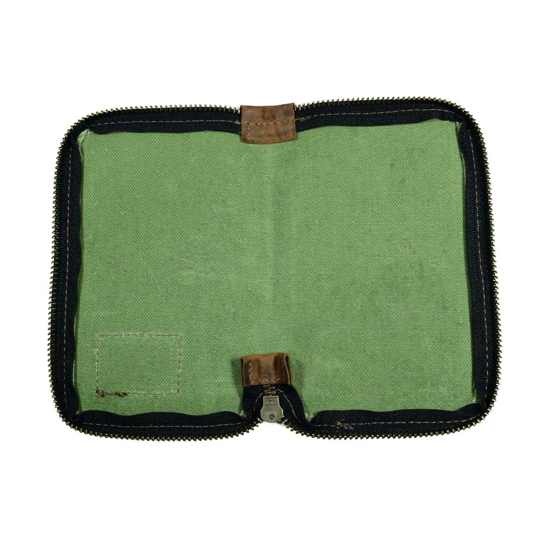 Open view showcasing the interior of the Waxed Canvas Zippered Journal Cover for Moleskine (Notebook NOT Included) by Hide & Drink. Perfect for Cahier Cases, it features durable Full Grain Leather and artisan expertise from La Antigua Guatemala & Oaxaca Mexico.