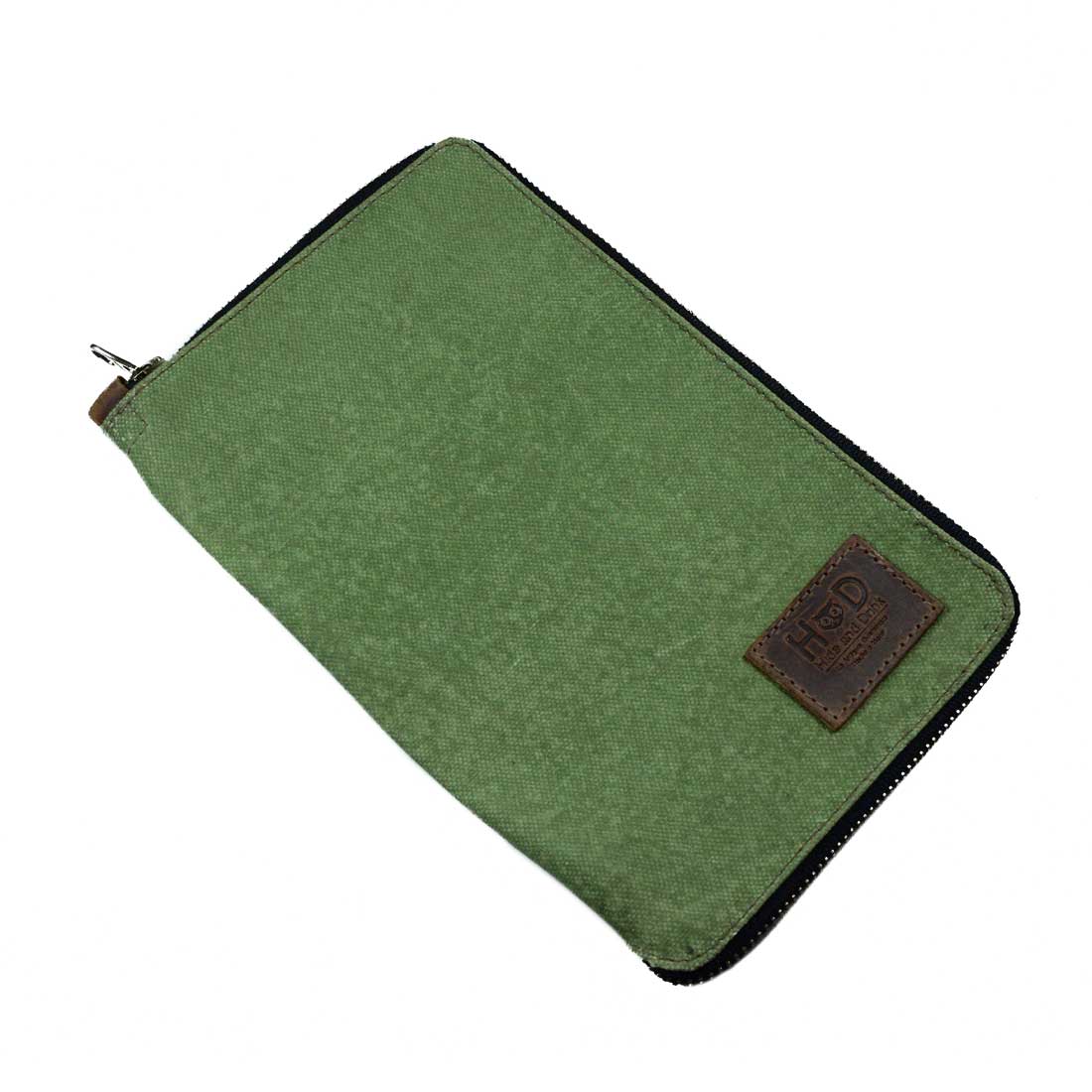 Interior of the Waxed Canvas Zippered Journal Cover for Moleskine (Notebook NOT Included) by Hide & Drink, with rugged green Canvas fabric. Perfect for Cahier Cases, showcasing quality Full Grain Leather and artisan dedication from La Antigua Guatemala & Oaxaca Mexico.