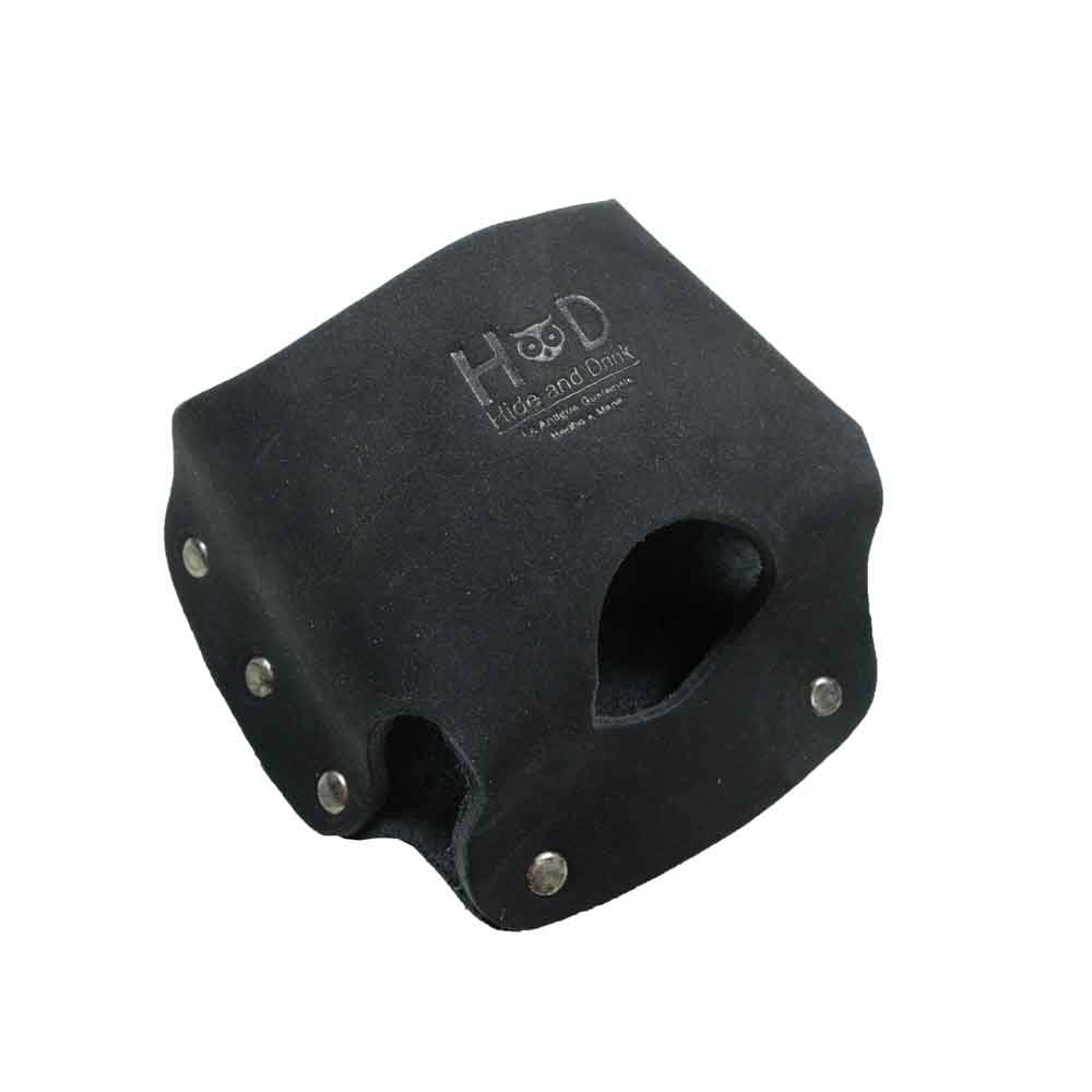 Hide & Drink's black suede Large Tape Holster, perfect for tradesfolk needing quick access to their tools. Constructed with high-quality materials, it's an ideal option for any Large Tape Measure.