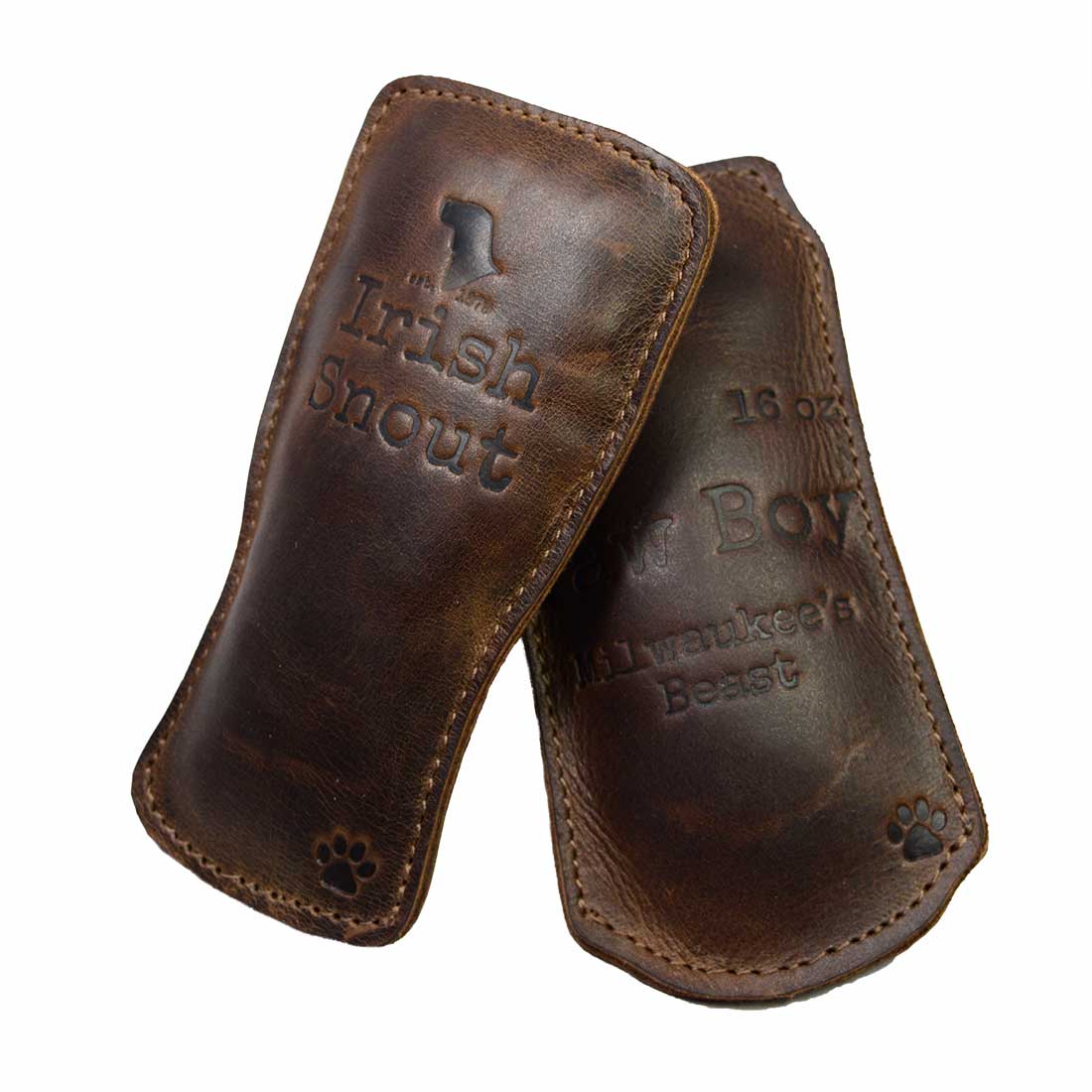 Chew Toy for Dogs Drinking Theme by Hide & Drink displays a pair of leather chew toys: 'Irish Snout' and 'Paw Boy'. Designed with durability in mind, these Dog Chew Toys (4 Pieces) / Drinks Chew Toy for Dogs feature artisan craftsmanship with full grain leather, hand cut, hand sewn, and fire branded, made in small batches in La Antigua Guatemala & Oaxaca Mexico.