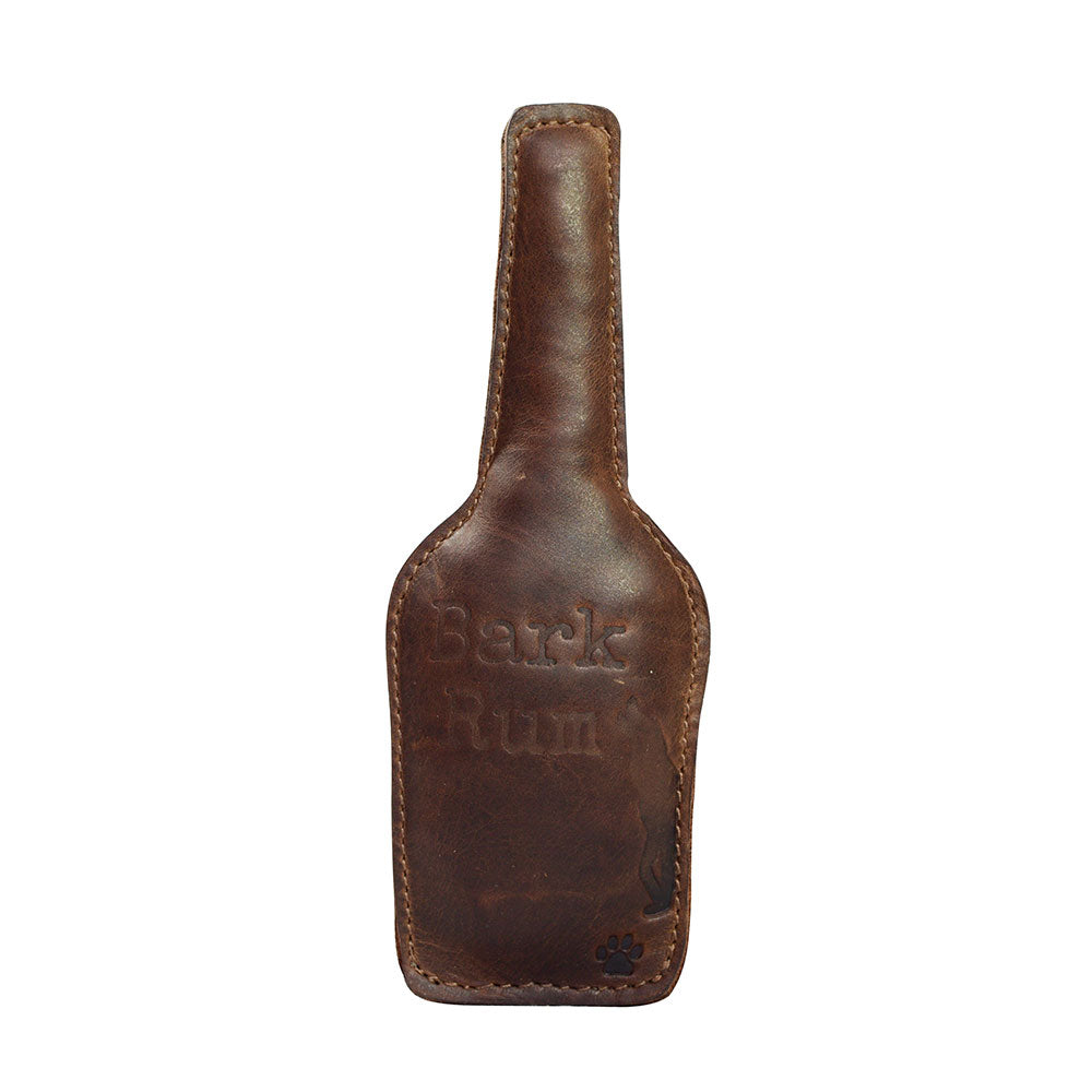 Chew Toy for Dogs Drinking Theme by Hide & Drink showcasing the 'Bark Rum' drink-themed dog chew toy, perfect for playful pet experiences. This Dog Chew Toy for Dogs is made from durable full grain leather and features craftsmanship that includes small batch production, hand cut, hand sewn, and fire branded in La Antigua Guatemala & Oaxaca Mexico.