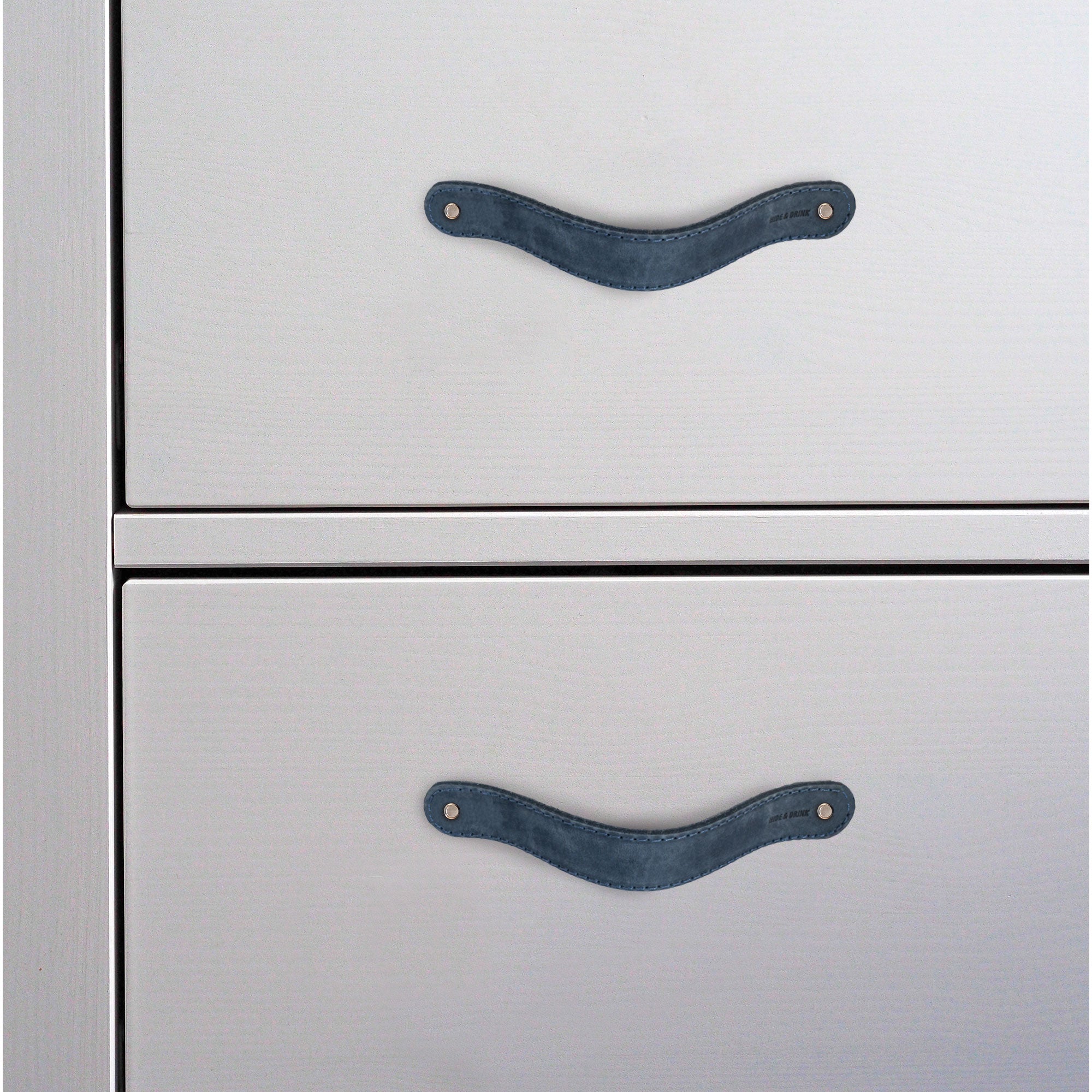 Hide & Drink Drawer Handles (4pk) revealing texture and quality in a range of colored leather handles. Stylish and durable, these easy-to-install pieces are hand cut and sewn.