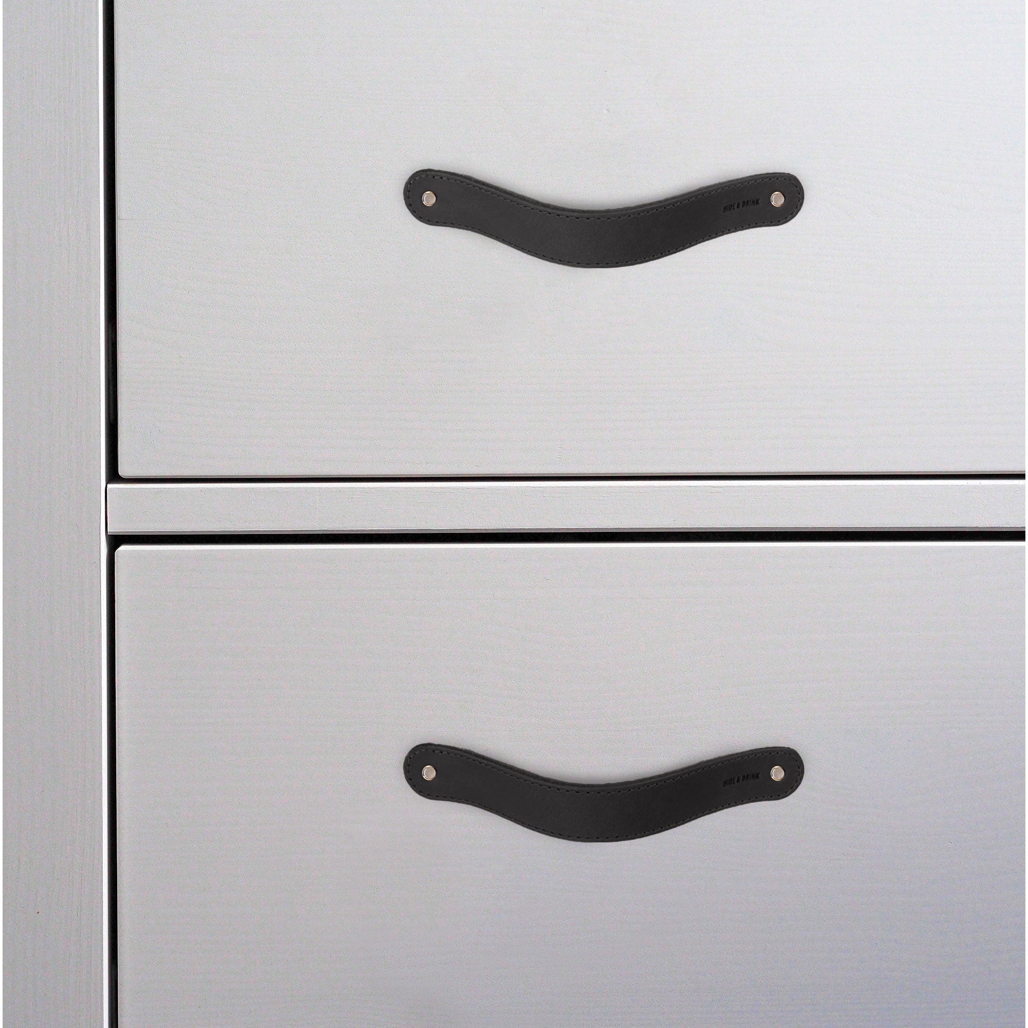 Hide & Drink Drawer Handles (4pk) displaying different shades of leather handles, showcasing durability and artisan craftsmanship. An ideal home accessory that is easy to install.
