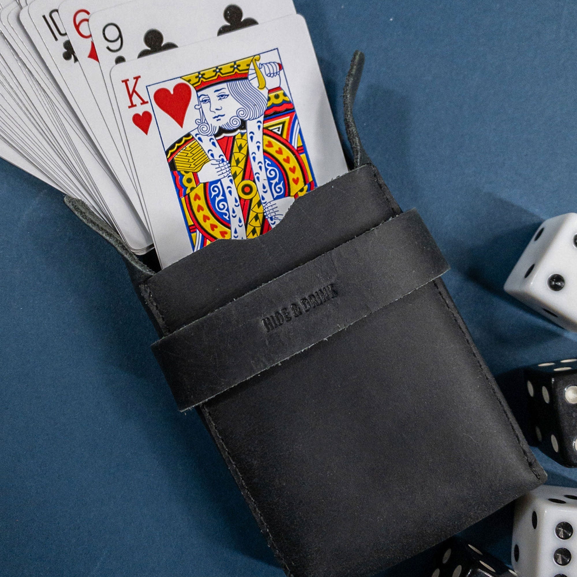 Hide & Drink's Playing Card Case displayed with an Ace of spades card, emphasizing its purpose. This classic case for playing cards (not included) is a perfect travel accessory for card enthusiasts, crafted from durable full grain leather. Handmade in La Antigua Guatemala, it reflects artisan skill and StockyardX's craftsmanship.