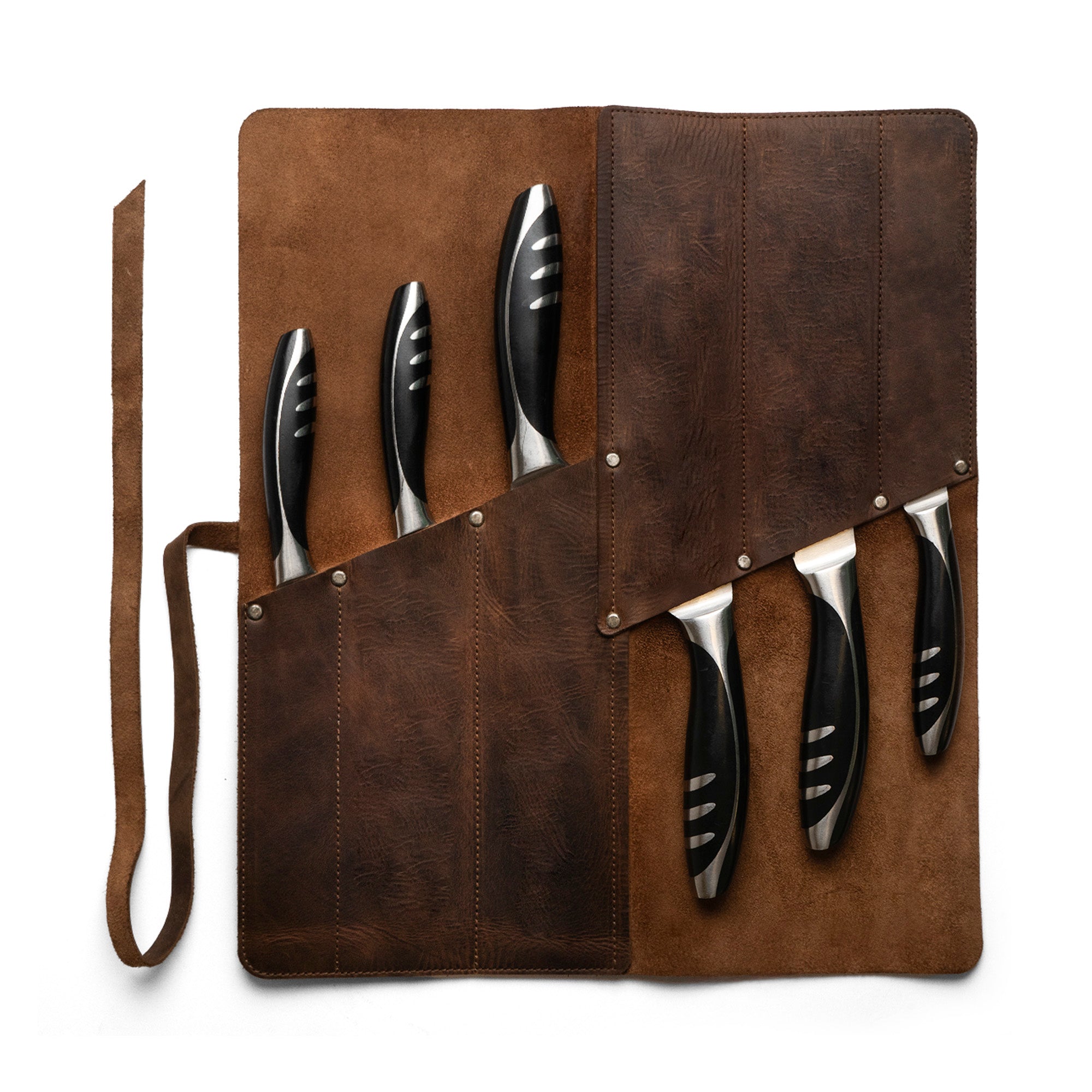 Cast Leather Co. Rectangular Knife Case with 6 Slots displayed open with knives inside. This Rectangular Knife Roll with 6 Slots serves as a Portable Knife Organizer Case, perfect for travel due to its compact design. Made from Full Grain Leather, it's a cooking accessory that blends artisanal craftsmanship with durability. StockyardX ensures it's a small batch production item, featuring hand cut, hand sewn details, and fire branded design, all handmade in La Antigua Guatemala & Oaxaca Mexico.