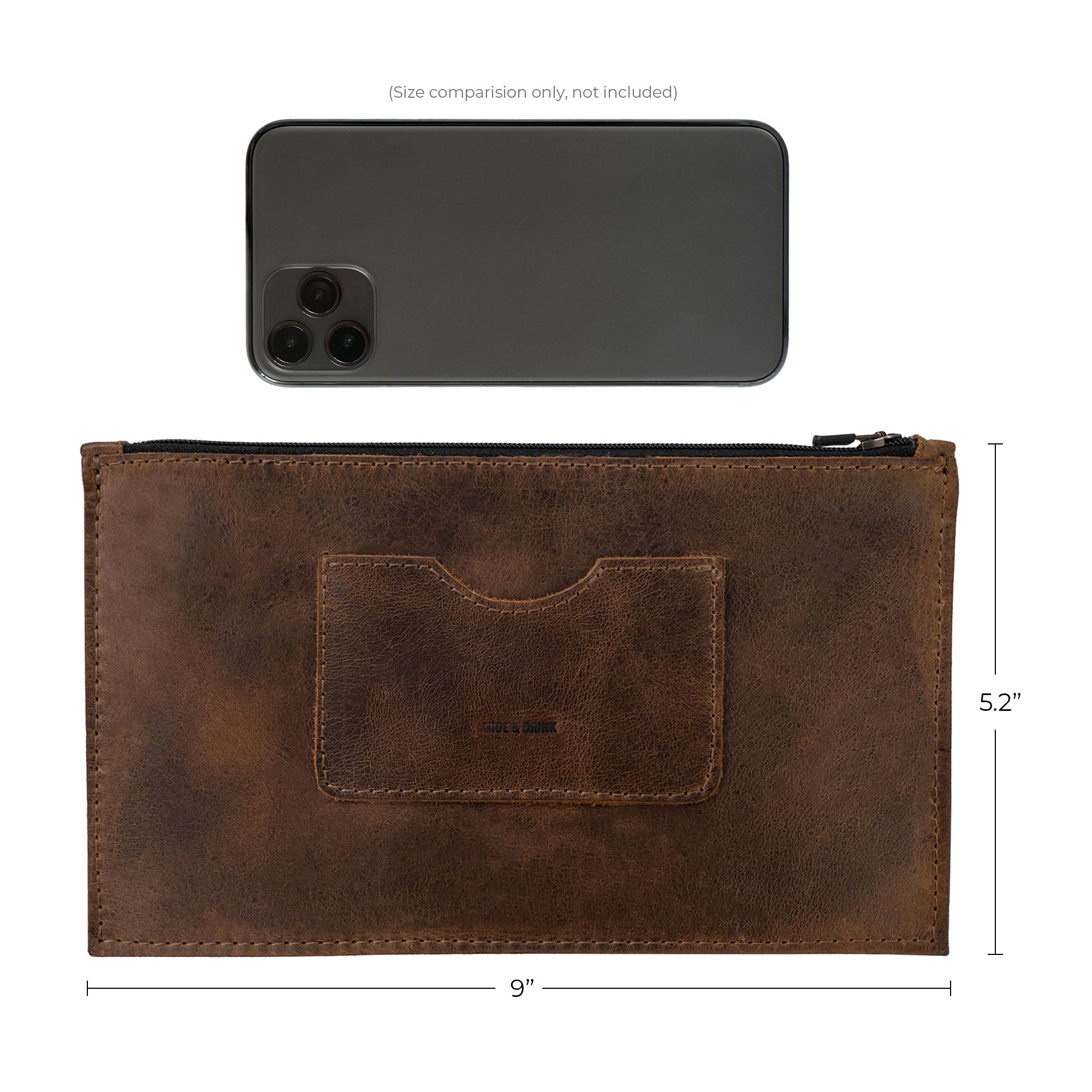 Size comparison of a brown rectangular zippered handbag by Hide & Drink next to an iPhone, showcasing its dimensions. Designed for women, this full grain leather female purse features a card slot, highlighting the skillful handmade craftsmanship in small batch production, typical of artisans from La Antigua Guatemala & Oaxaca Mexico.
