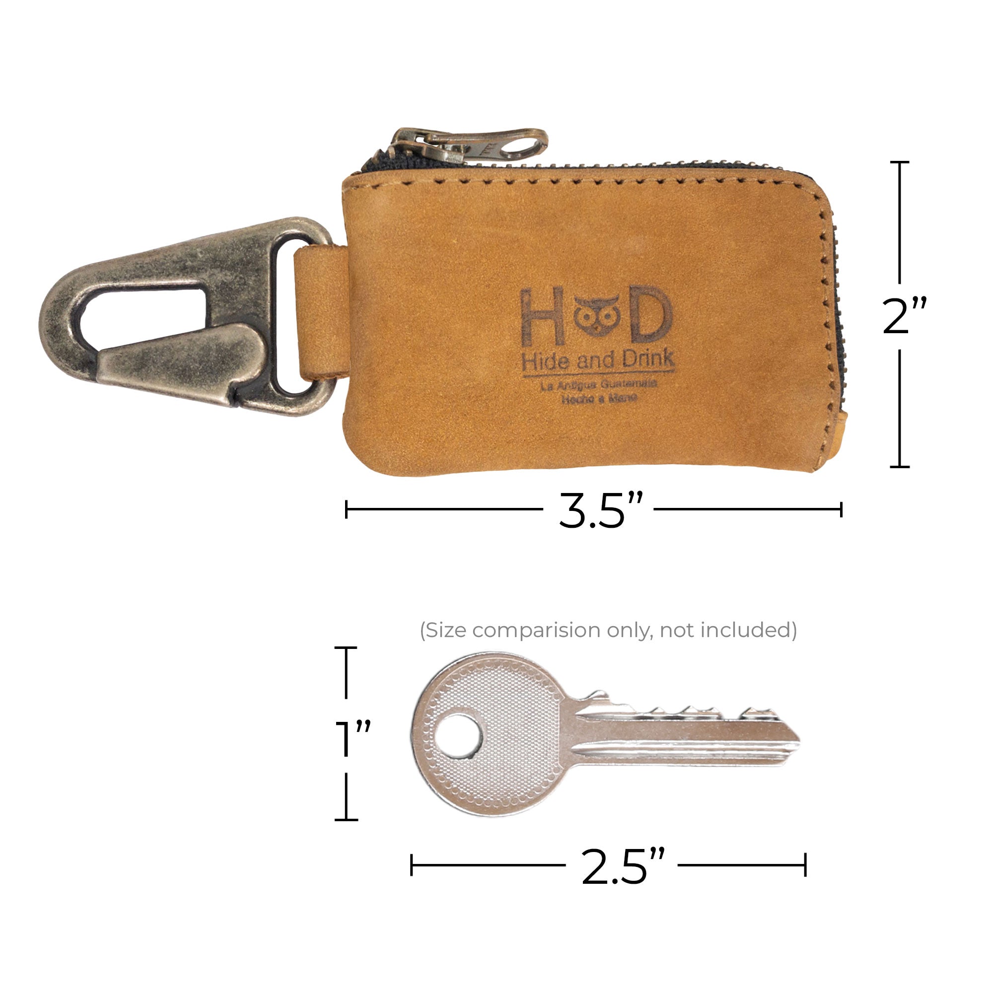 A spacious view of the Hide & Drink Car Key Holder in its functional use, displaying cash and keys. This stylish accessory holds headphone cables and flash drives, handcrafted in La Antigua Guatemala & Oaxaca Mexico.