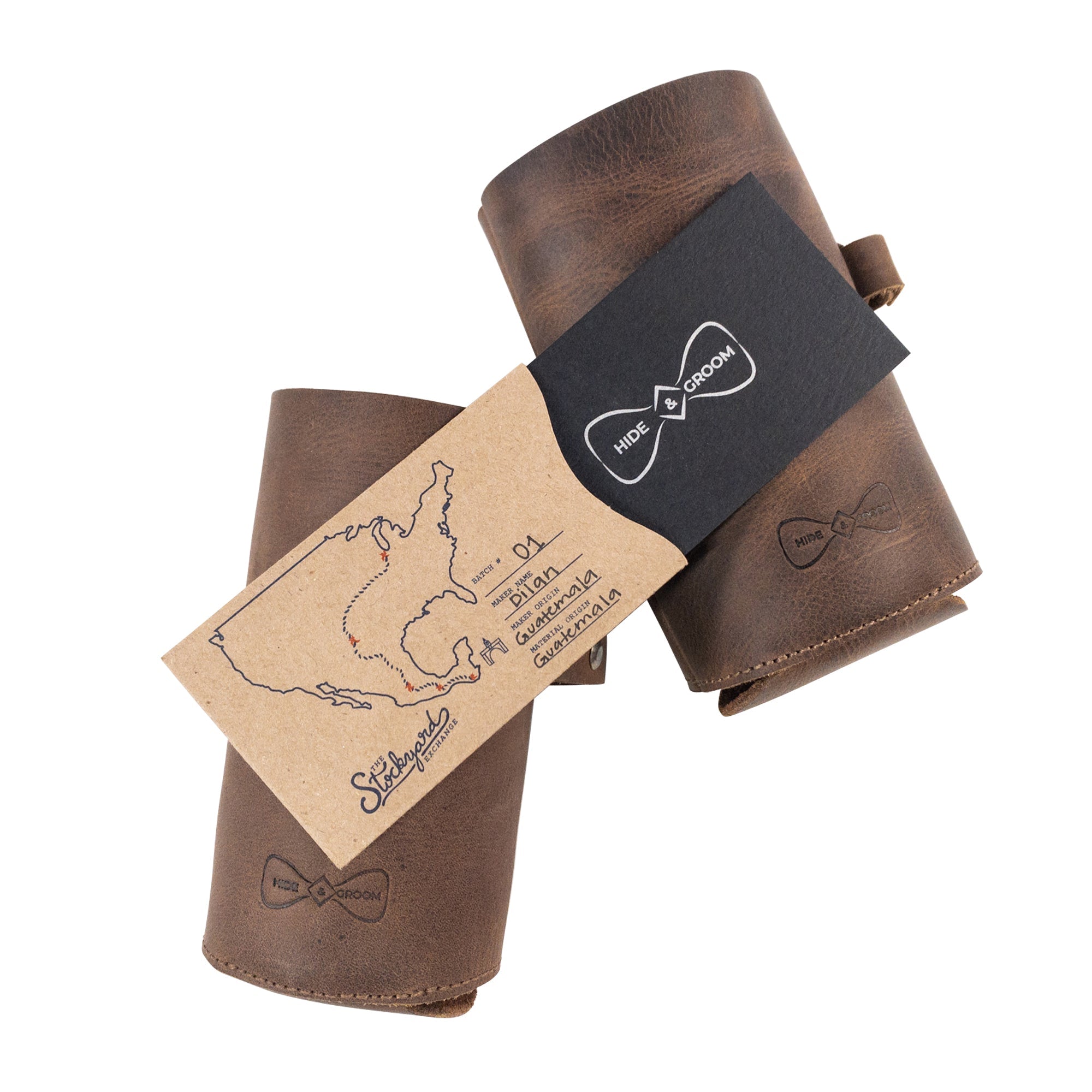 Hide & Groom Beer Bottle Sleeve Set of 2 with packaging, showcasing artisan craftsmanship in full grain leather, perfect for weddings and best man gifts. Handmade in La Antigua Guatemala, featuring a collapsible design and bottle opener slot.