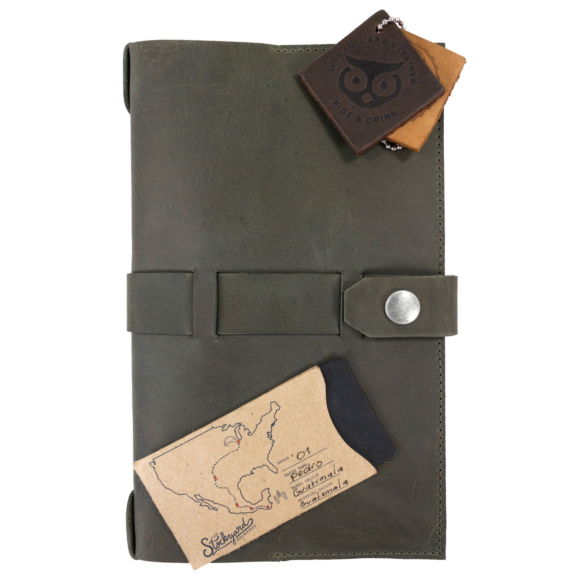 Interior of Hide & Drink's Riveted Field Note Cover for Moleskine (5 x 8.25 in.) Notebook NOT Included, displaying lined paper ready for notes. This top-quality cover exemplifies full grain leather craftsmanship from La Antigua Guatemala & Oaxaca, Mexico.