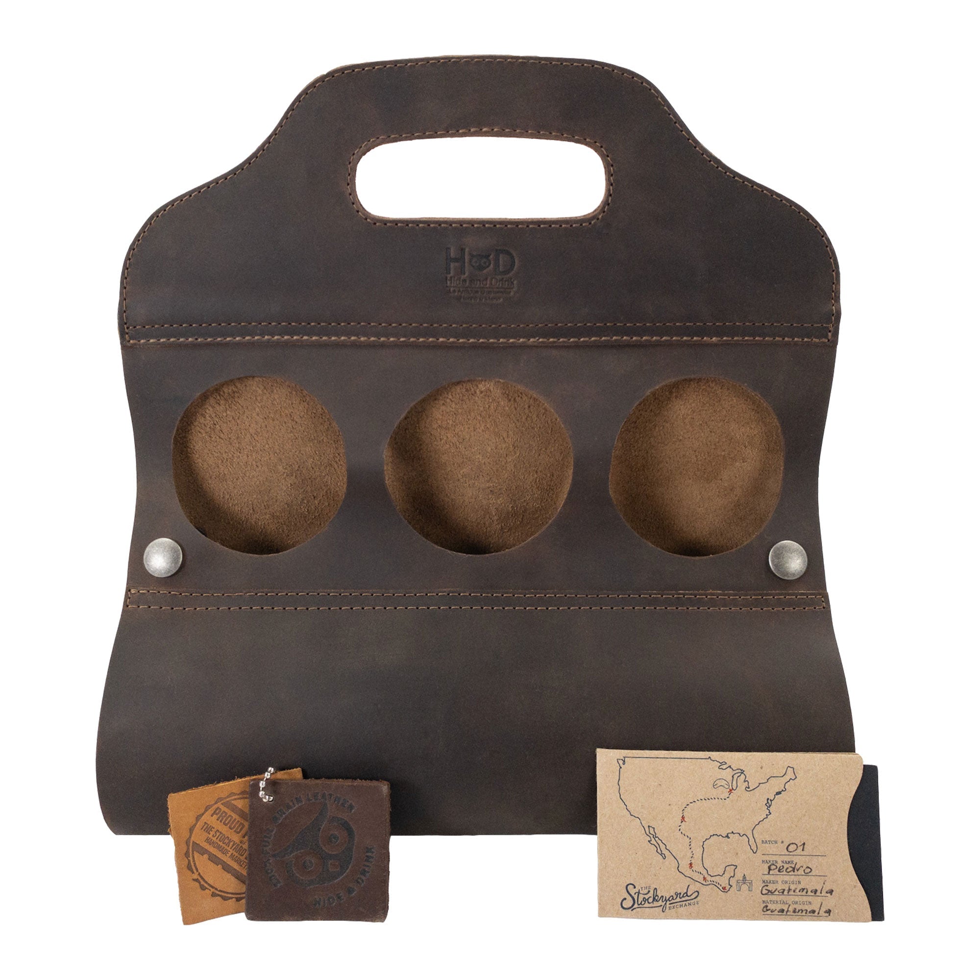 Hide & Drink's Six Bottle Caddy with a label showcasing artisan craftsmanship, designed as a Beer Holster for Bike. This Full Grain Leather product is the result of Small Batch Production, showcasing meticulous hand cut and hand sewn techniques, ideal for gifting.