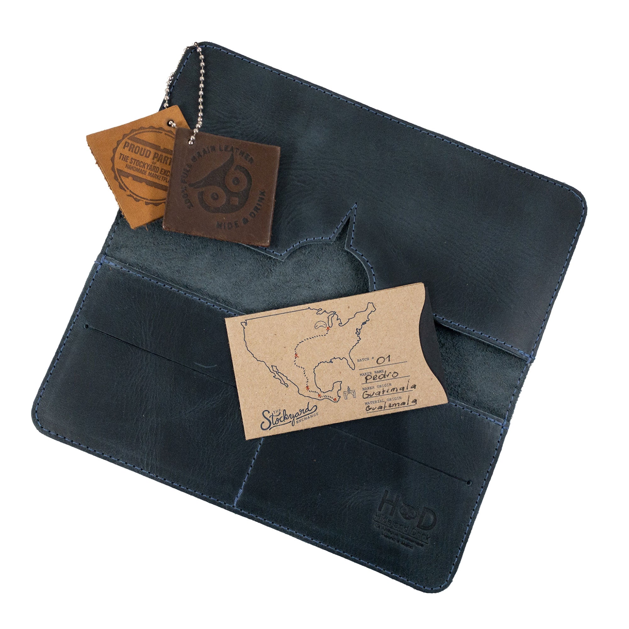 Closed view of the rustic bifold wallet for cellphone by Hide & Drink, highlighting its aesthetic appeal. This Bifold Wallet for Cellphone is expertly crafted from Full Grain Leather, perfect for those who appreciate artisan quality. Made with care and skill through small batch production in La Antigua Guatemala & Oaxaca Mexico.