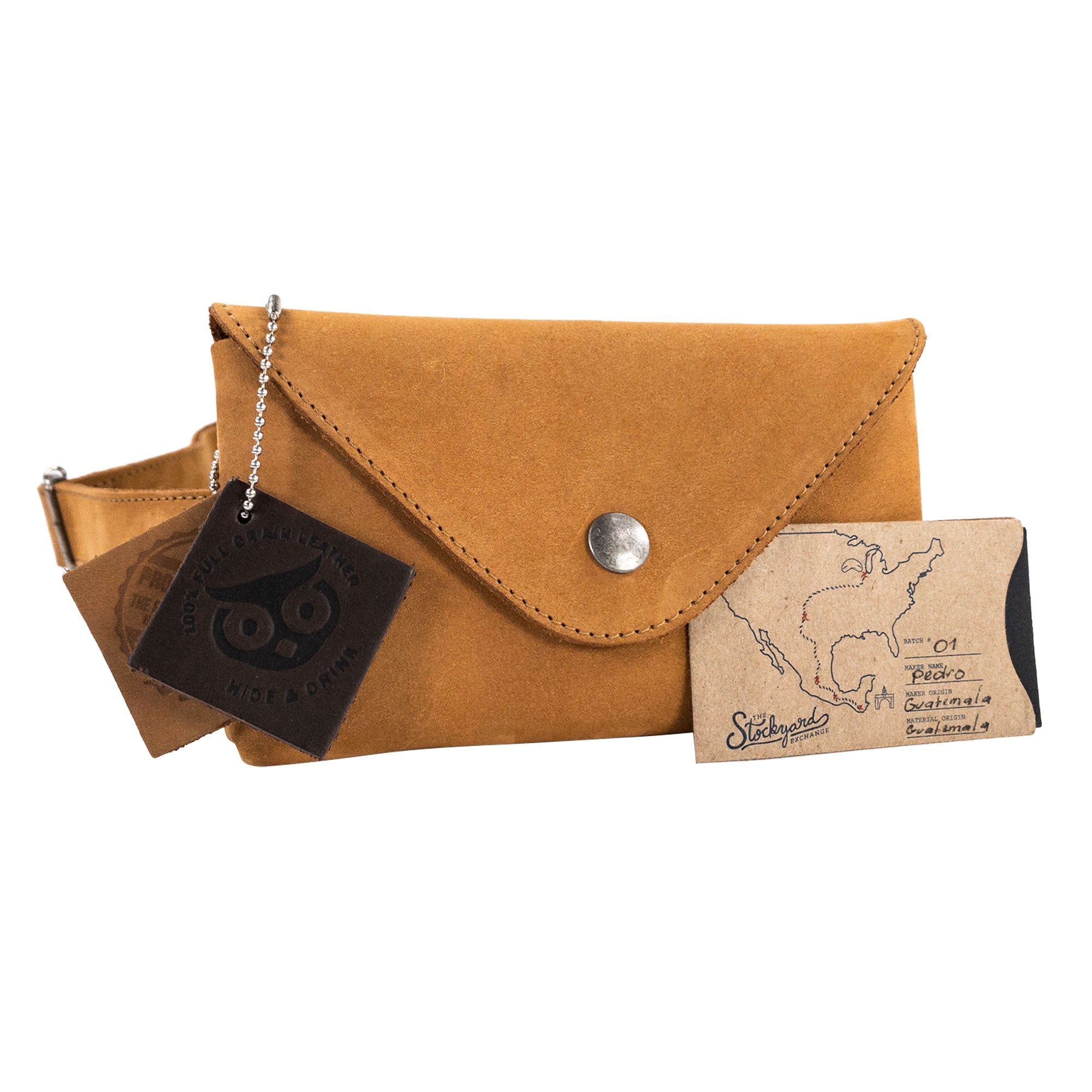 Side view of Hide & Drink's Fancy Fanny Pack, illustrating its compact design. This full grain leather waist pouch is perfect for convenience as a stylish purse and for storing essentials during travel.