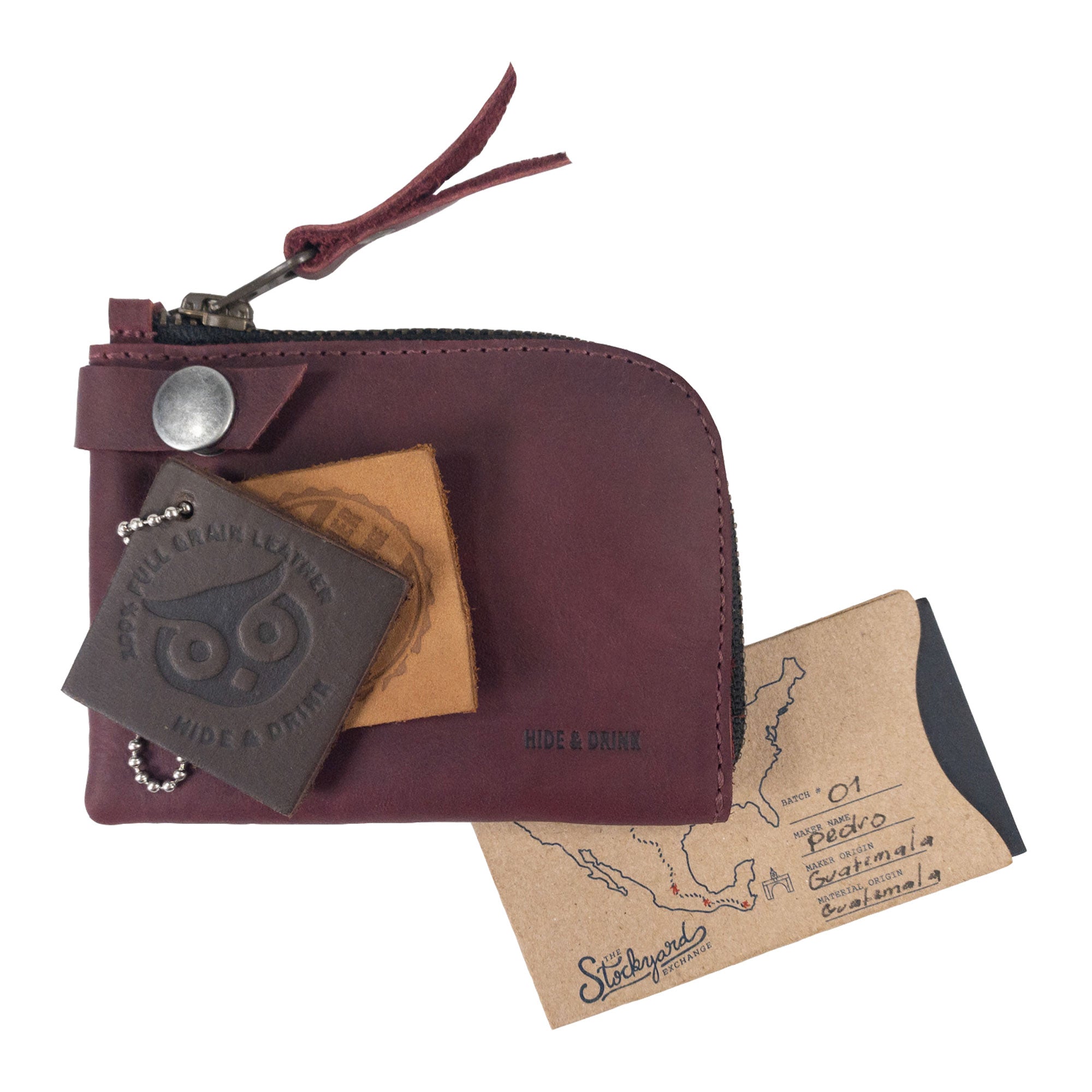 Interior view of the Lion's Mane Zippered Wallet by Hide & Drink, displaying its hand-sewn craftsmanship and organized compartments for cards and cash.