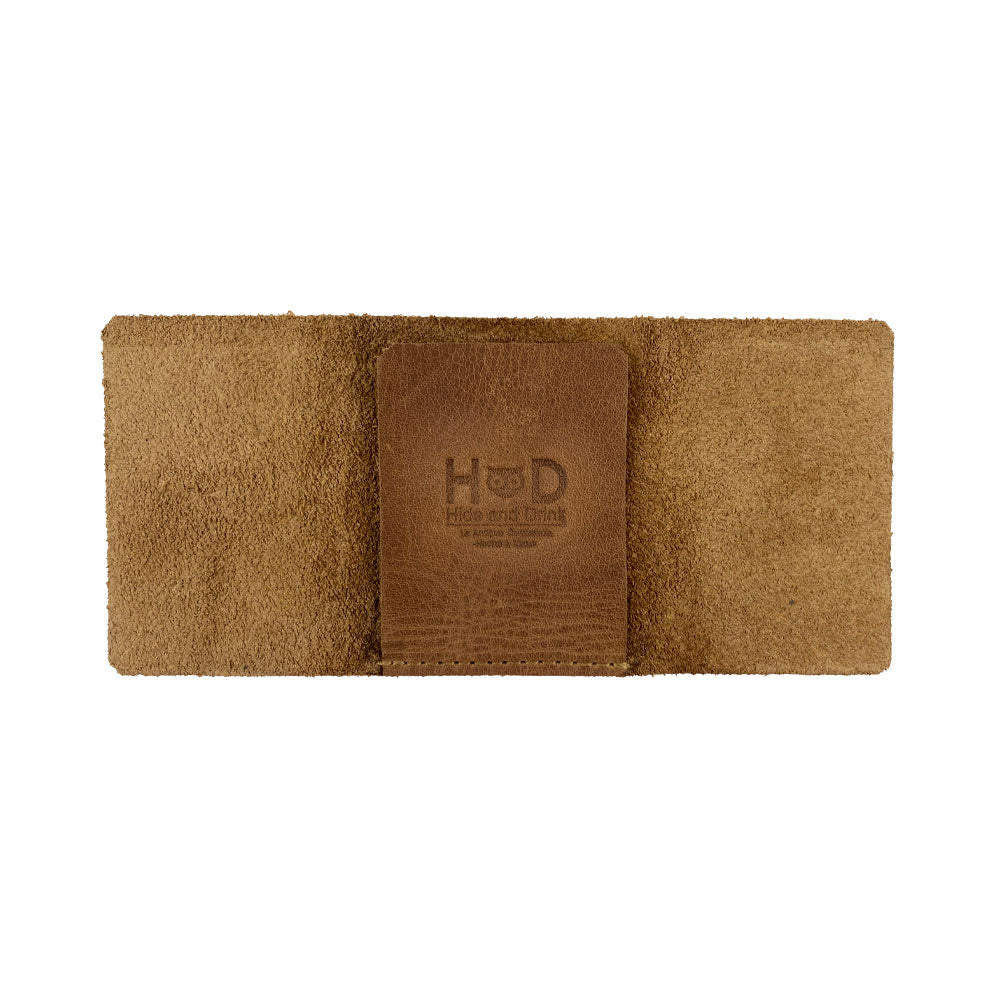 A flat view of the Hide & Drink Minimalist Wallet Bills Only made from soft Full Grain Leather. This Ultra Minimalist Wallet serves as a classy cash organizer that reflects the values of artisan craftsmanship with hand sewn quality from La Antigua Guatemala.