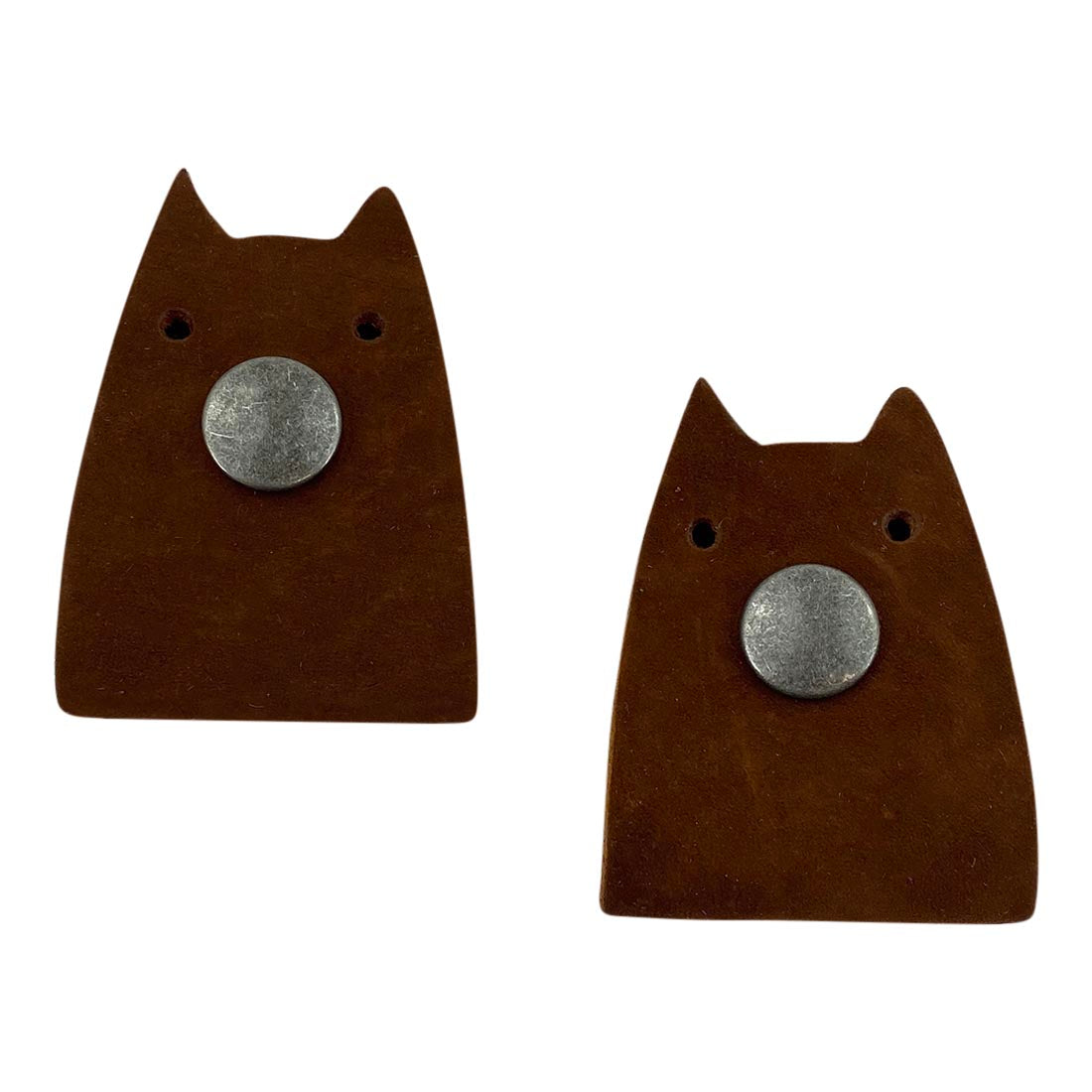 Taco Dog's Cat Cord Keeper (2 Pack) in brown leather, ideal for effective cable management. Provides a stylish solution for organizing earbuds, headphones, and chargers. Each piece is handmade in La Antigua Guatemala & Oaxaca Mexico.