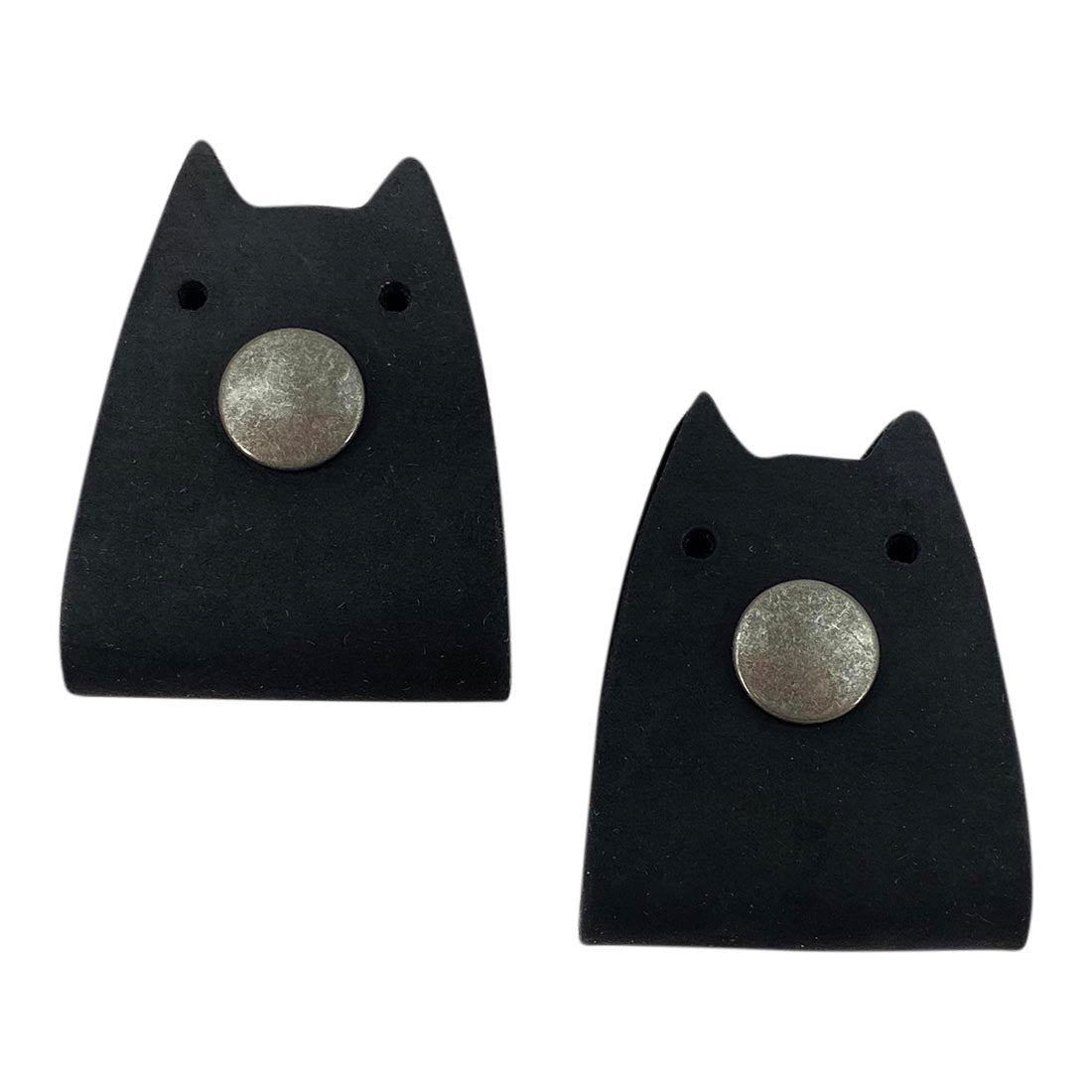 Taco Dog's Cat Cord Keeper (2 Pack) in black leather, showcasing its sleek design. Ideal for tidying your cables, earbuds, headphones, and chargers. Clips easily together for travel-friendly organization. Artisan crafted with attention to detail in La Antigua Guatemala & Oaxaca Mexico.